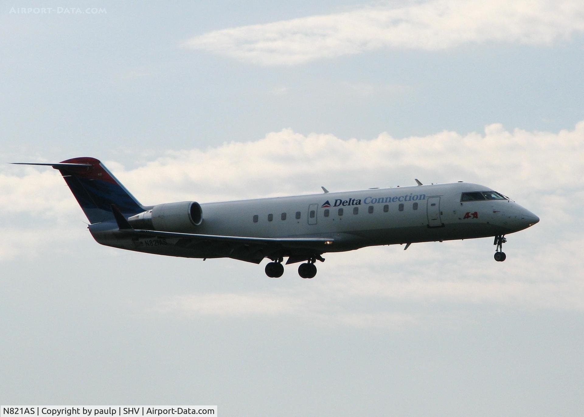 N821AS, 1997 Canadair CRJ-200LR (CL-600-2B19) C/N 7194, Landing at Shreveport Regional.