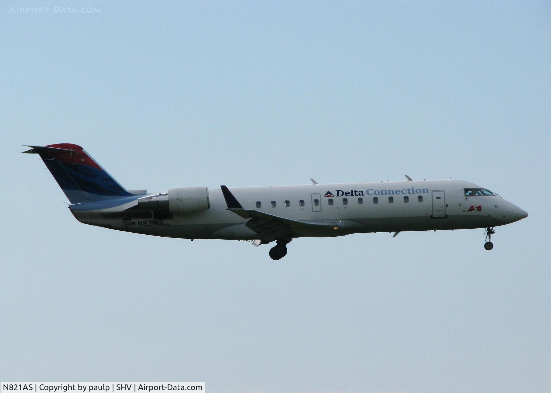 N821AS, 1997 Canadair CRJ-200LR (CL-600-2B19) C/N 7194, Landing at Shreveport Regional.