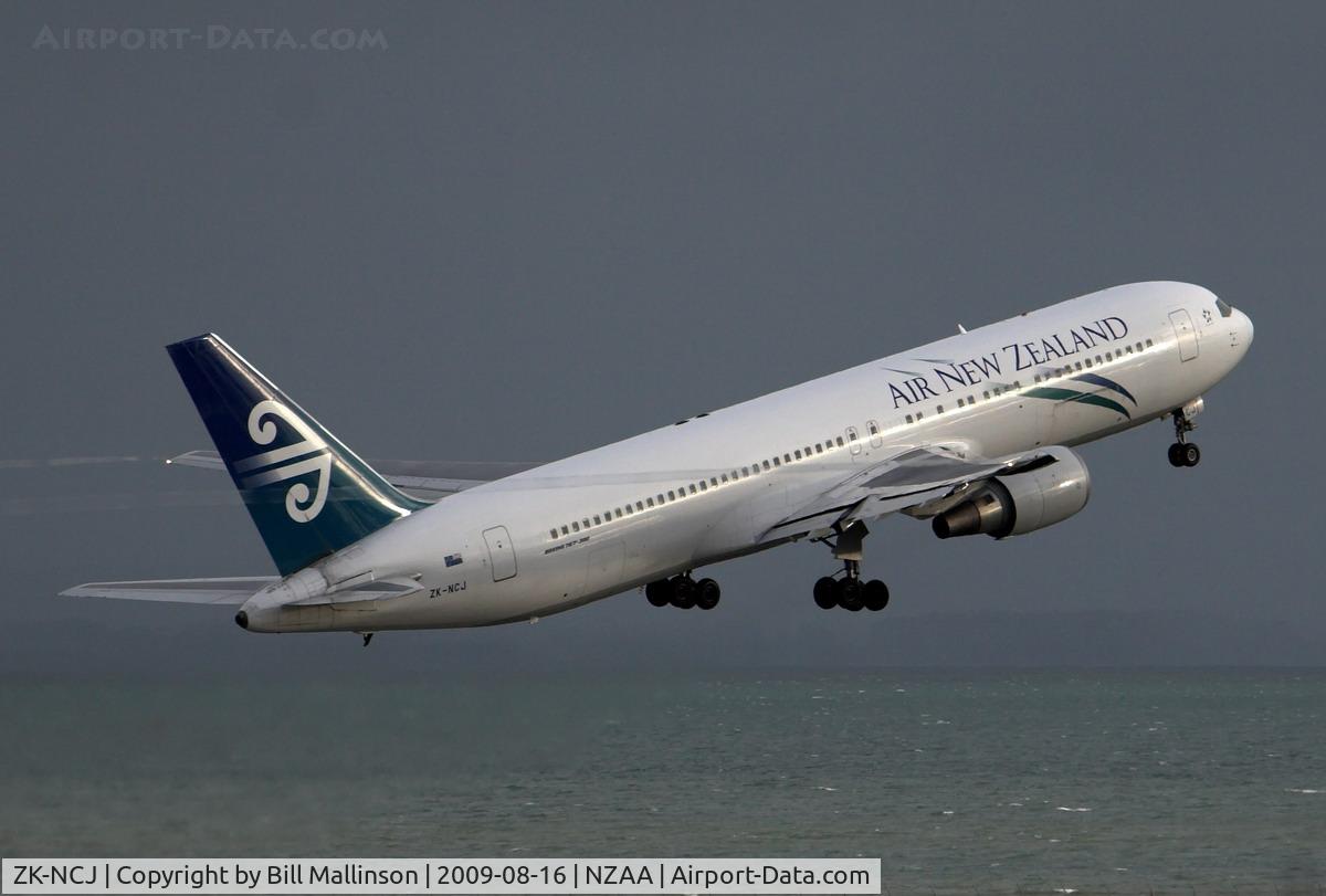 ZK-NCJ, 1995 Boeing 767-319/ER C/N 26915, white a/c & black clouds = good contrast