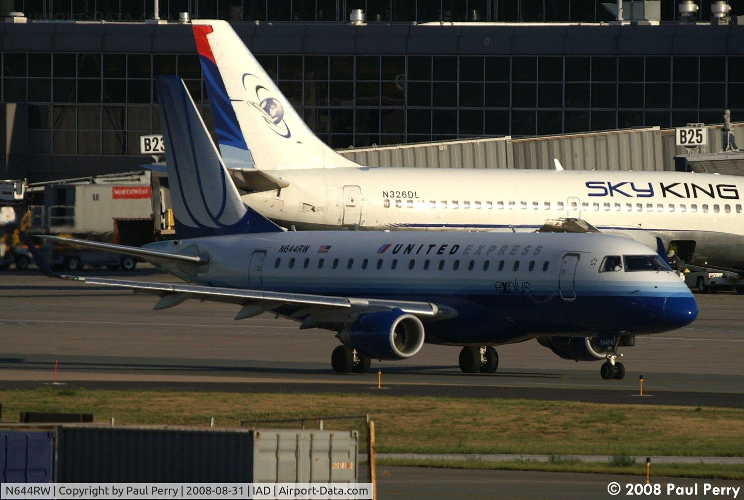 N644RW, 2004 Embraer 170SE (ERJ-170-100SE) C/N 17000061, Making her way along the terminal ramp