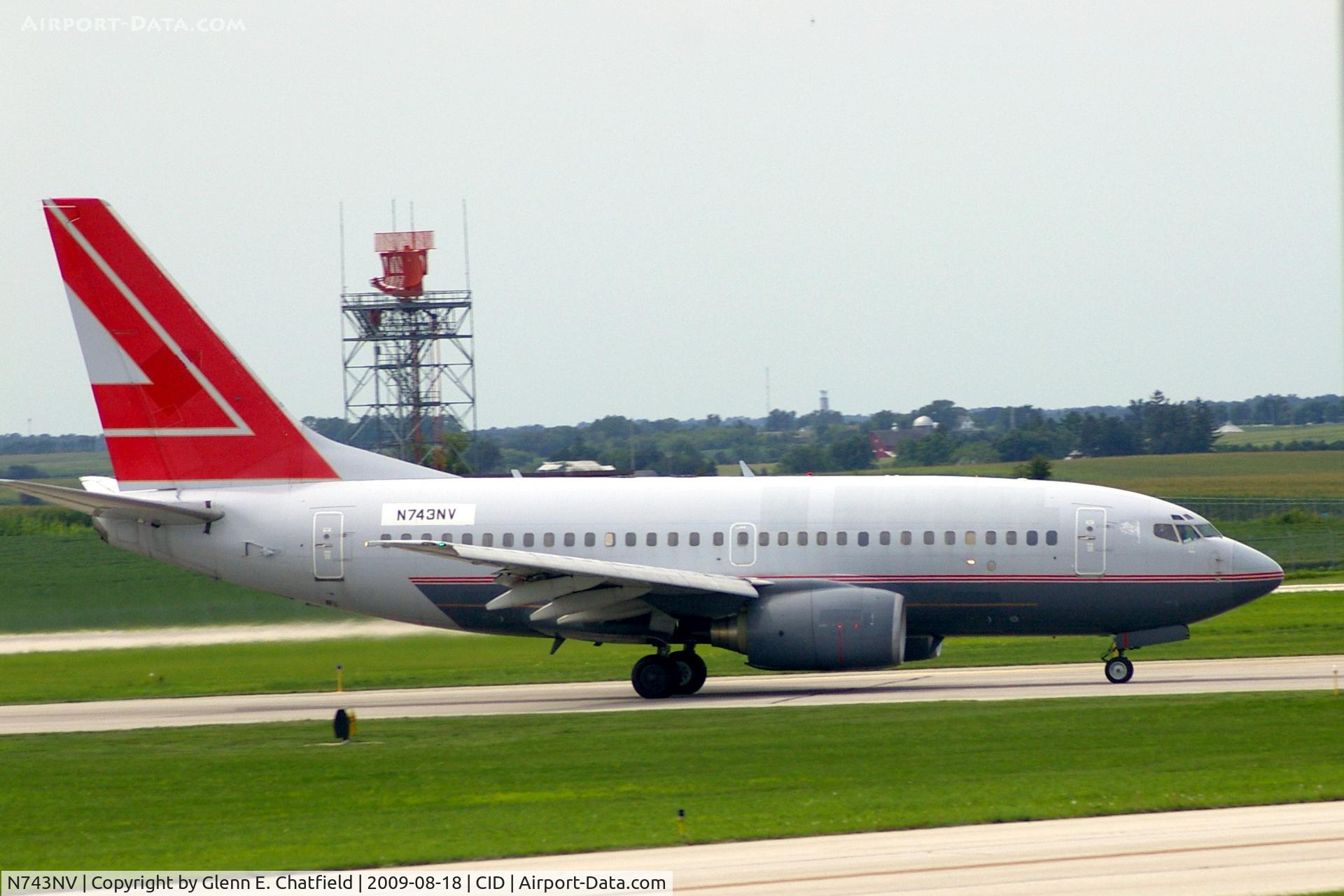 N743NV, 2000 Boeing 737-6Z9 C/N 30137, Doing touch and goes on Ry 31.  Seen from my window.