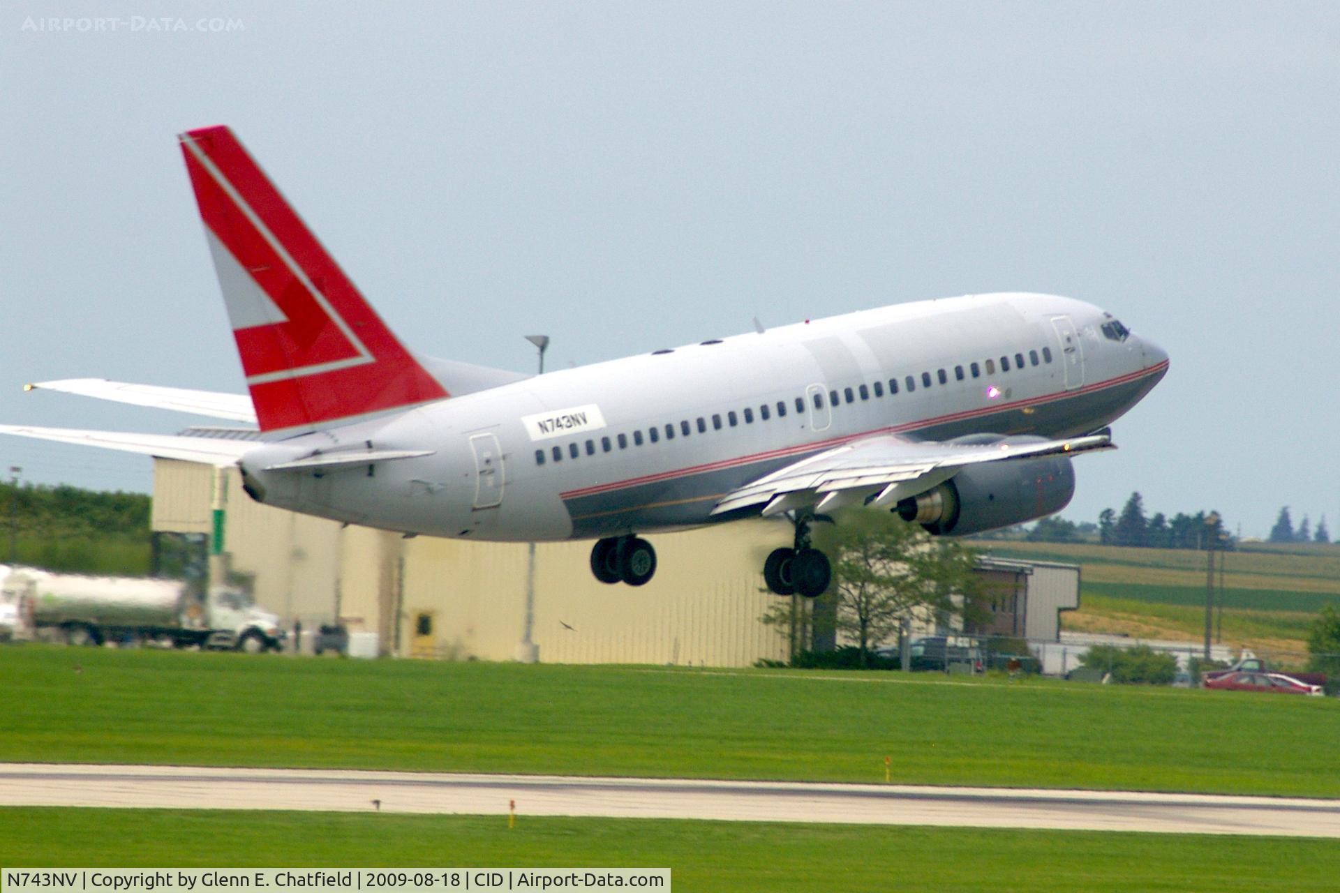 N743NV, 2000 Boeing 737-6Z9 C/N 30137, Doing touch and goes on Ry 31.  Seen from my window.