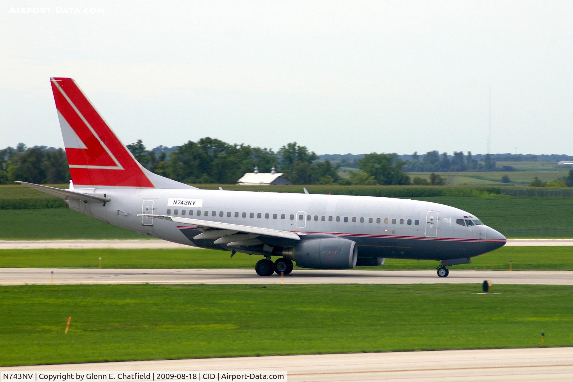 N743NV, 2000 Boeing 737-6Z9 C/N 30137, Doing touch and goes on Ry 31.  Seen from my window.