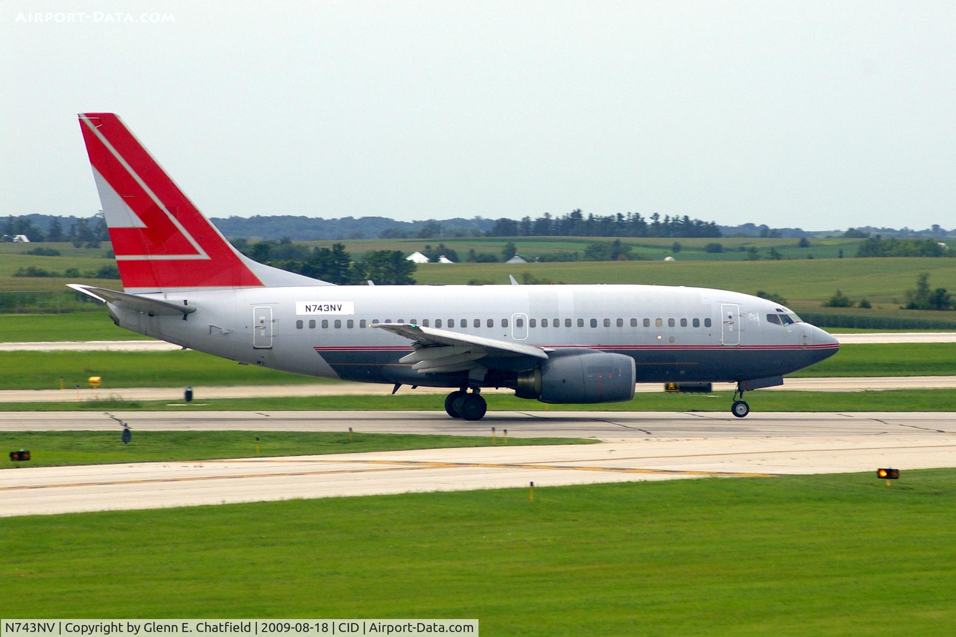 N743NV, 2000 Boeing 737-6Z9 C/N 30137, Doing touch and goes on Ry 31.  Seen from my window.