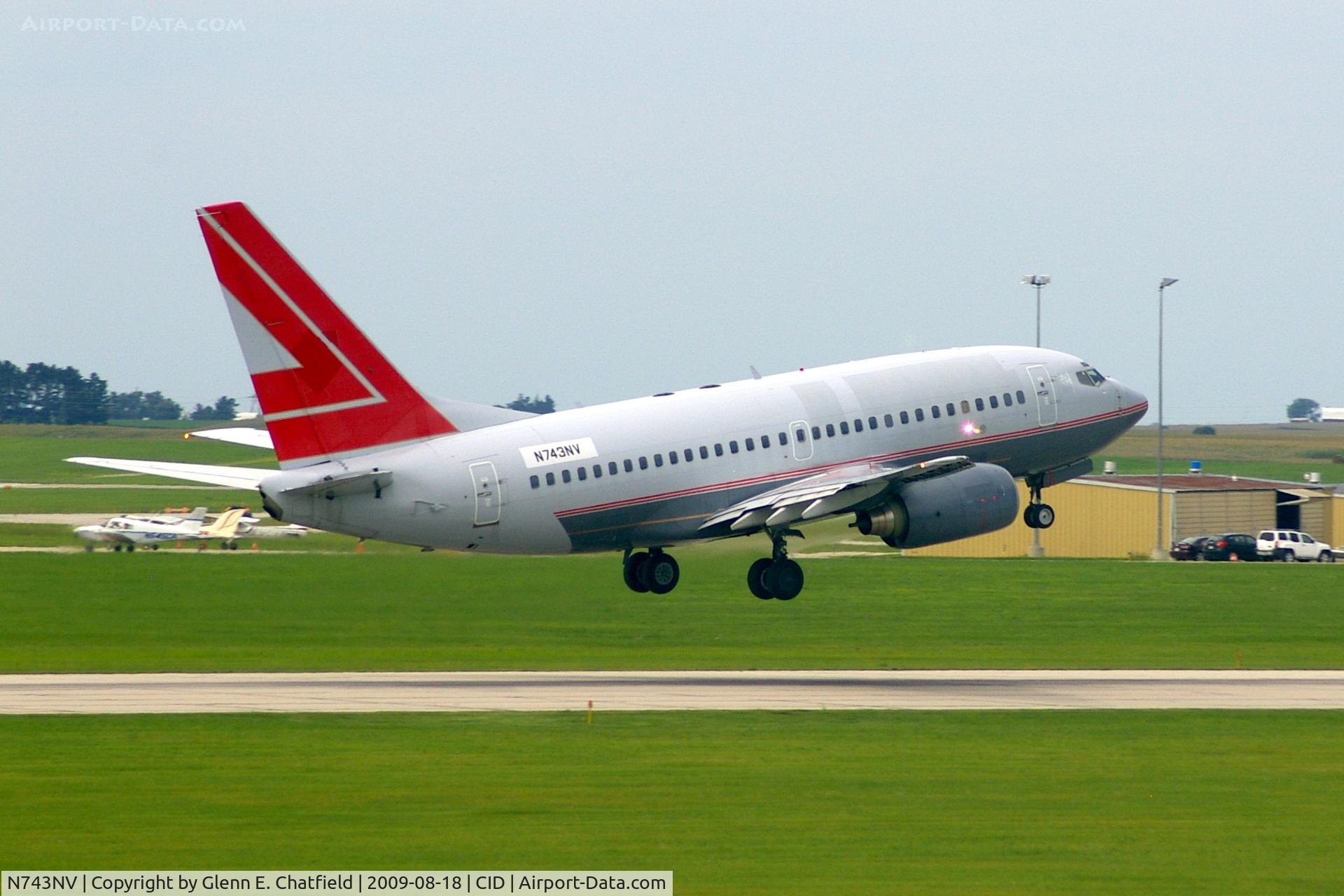 N743NV, 2000 Boeing 737-6Z9 C/N 30137, Doing touch and goes on Ry 31.  Seen from my window.