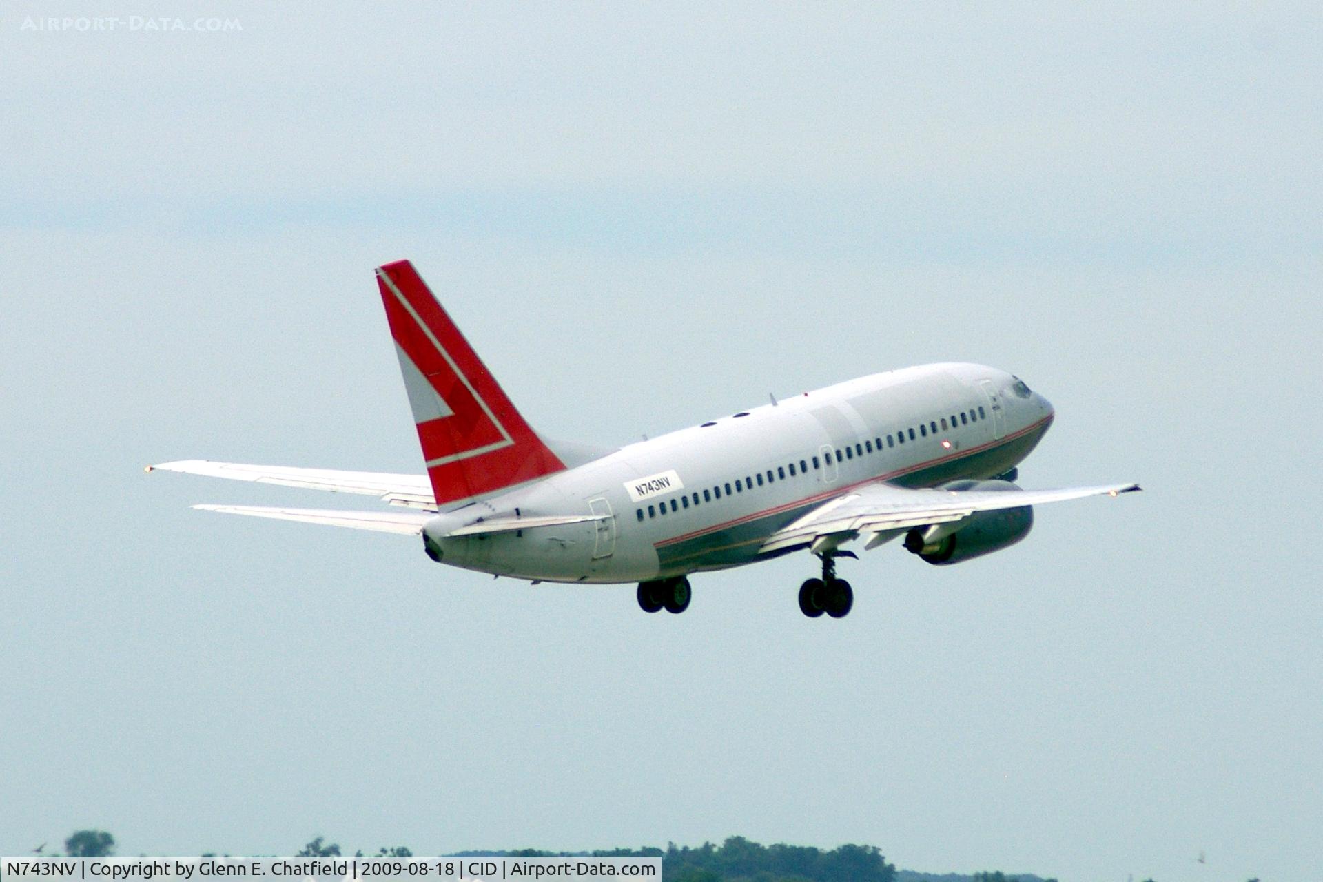 N743NV, 2000 Boeing 737-6Z9 C/N 30137, Doing touch and goes on Ry 31.  Seen from my window.