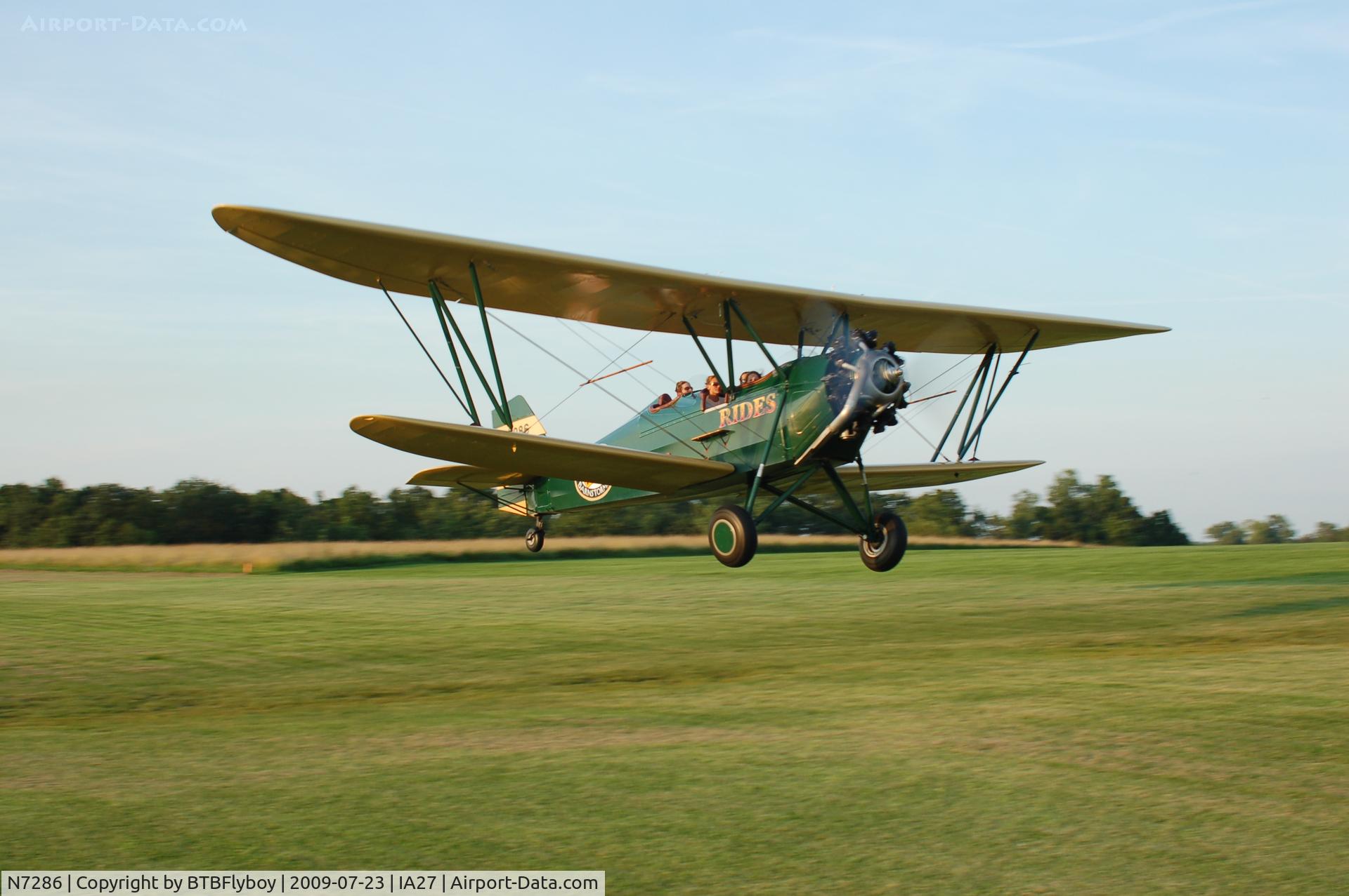 N7286, 1941 New Standard D-25A C/N 167W, Hauling rides from Antique Airfield near Blakesburg, IA during RAGBRAI