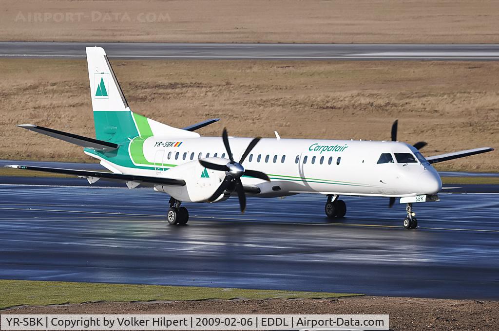 YR-SBK, 1996 Saab 2000 C/N 2000-033, at dus