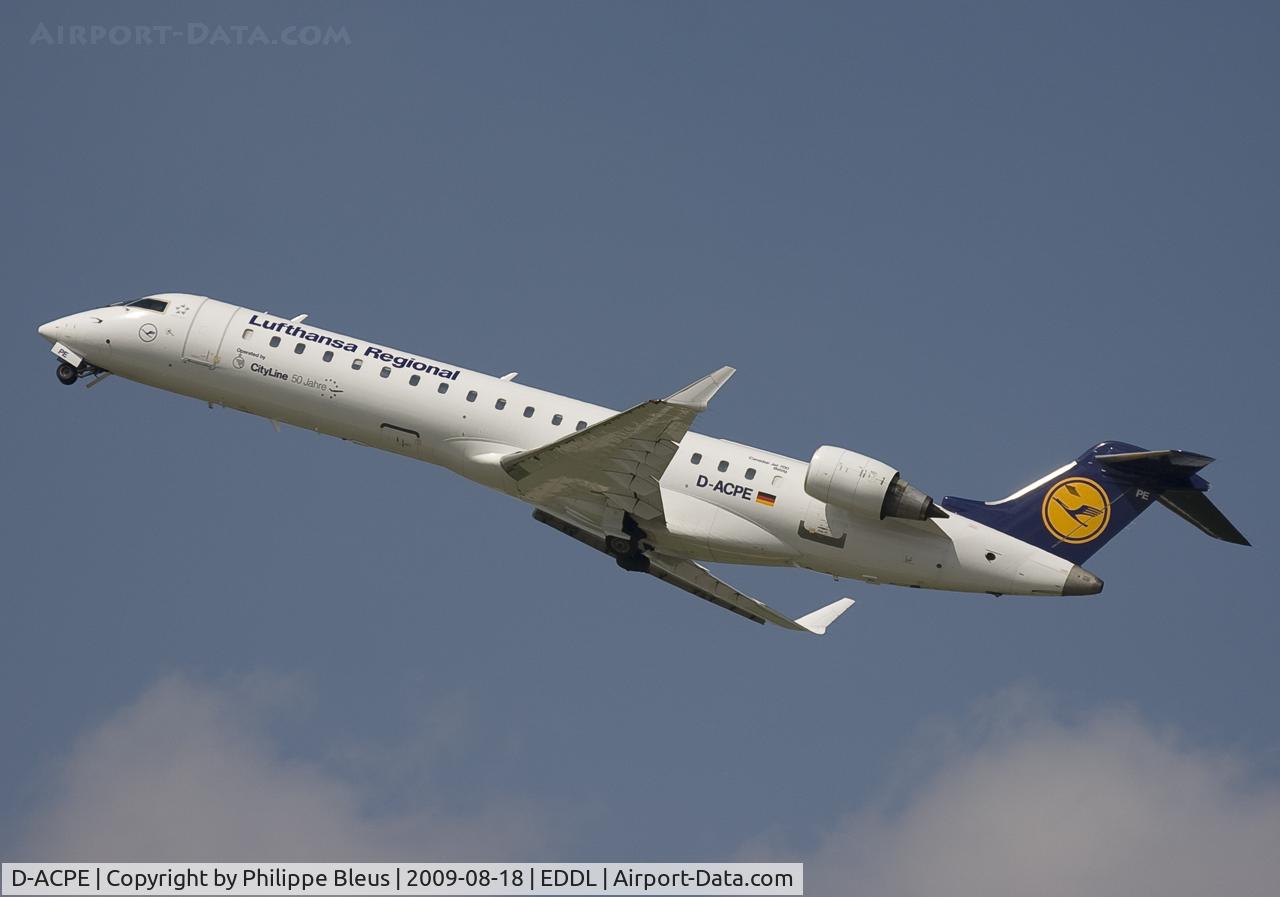 D-ACPE, 2001 Bombardier CRJ-701ER (CL-600-2C10) Regional Jet C/N 10027, Elegant business jet, climbing from rwy 23L.