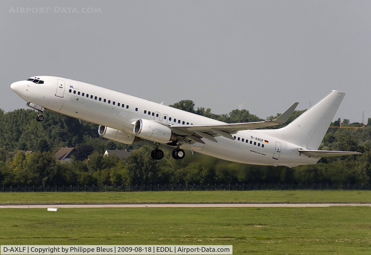 D-AXLF, 1998 Boeing 737-8Q8 C/N 28218, All white, rising from rwy 23L.