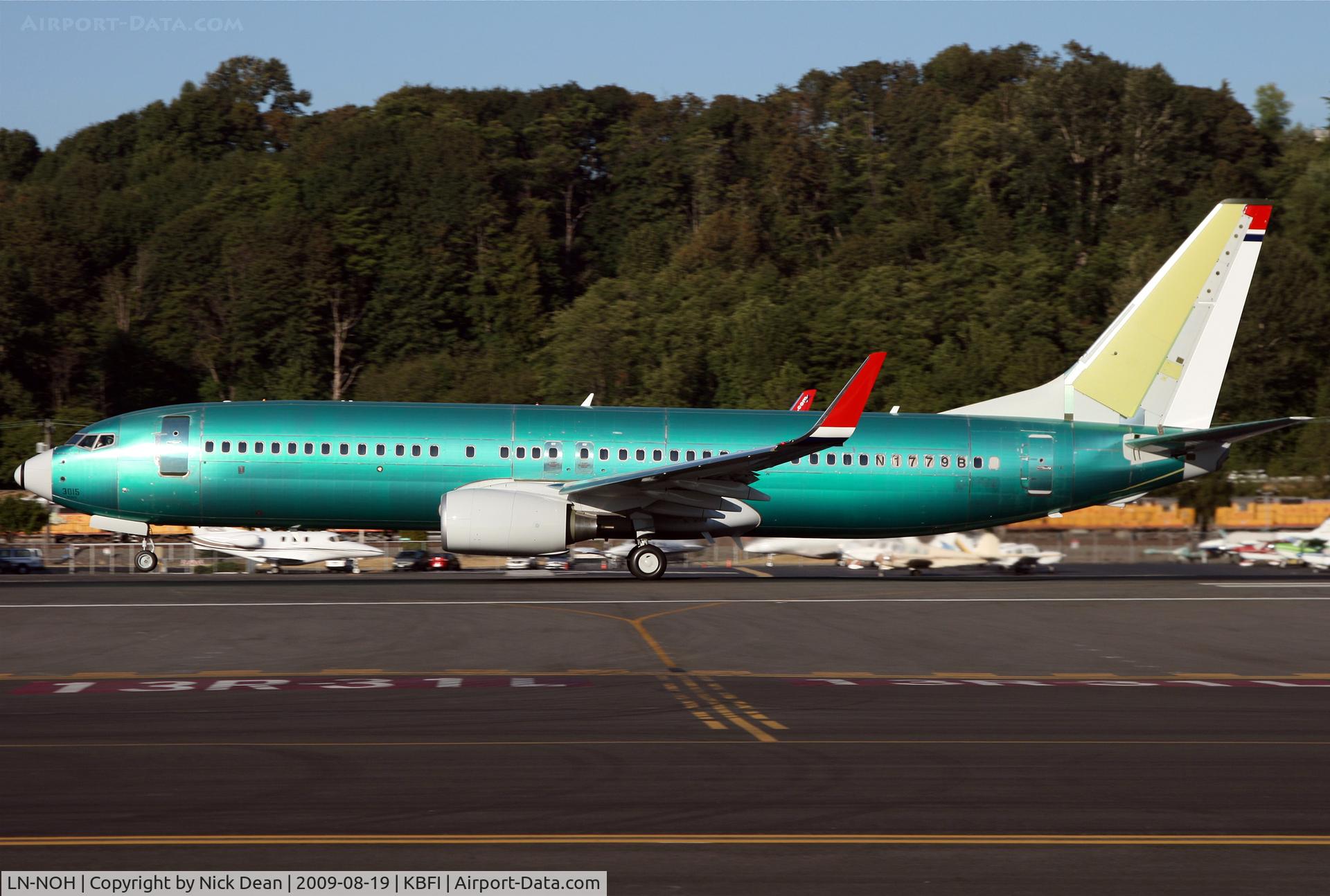 LN-NOH, 2009 Boeing 737-86N C/N 36814, KBFI Carrying N1779B in the rear windows for the test flight