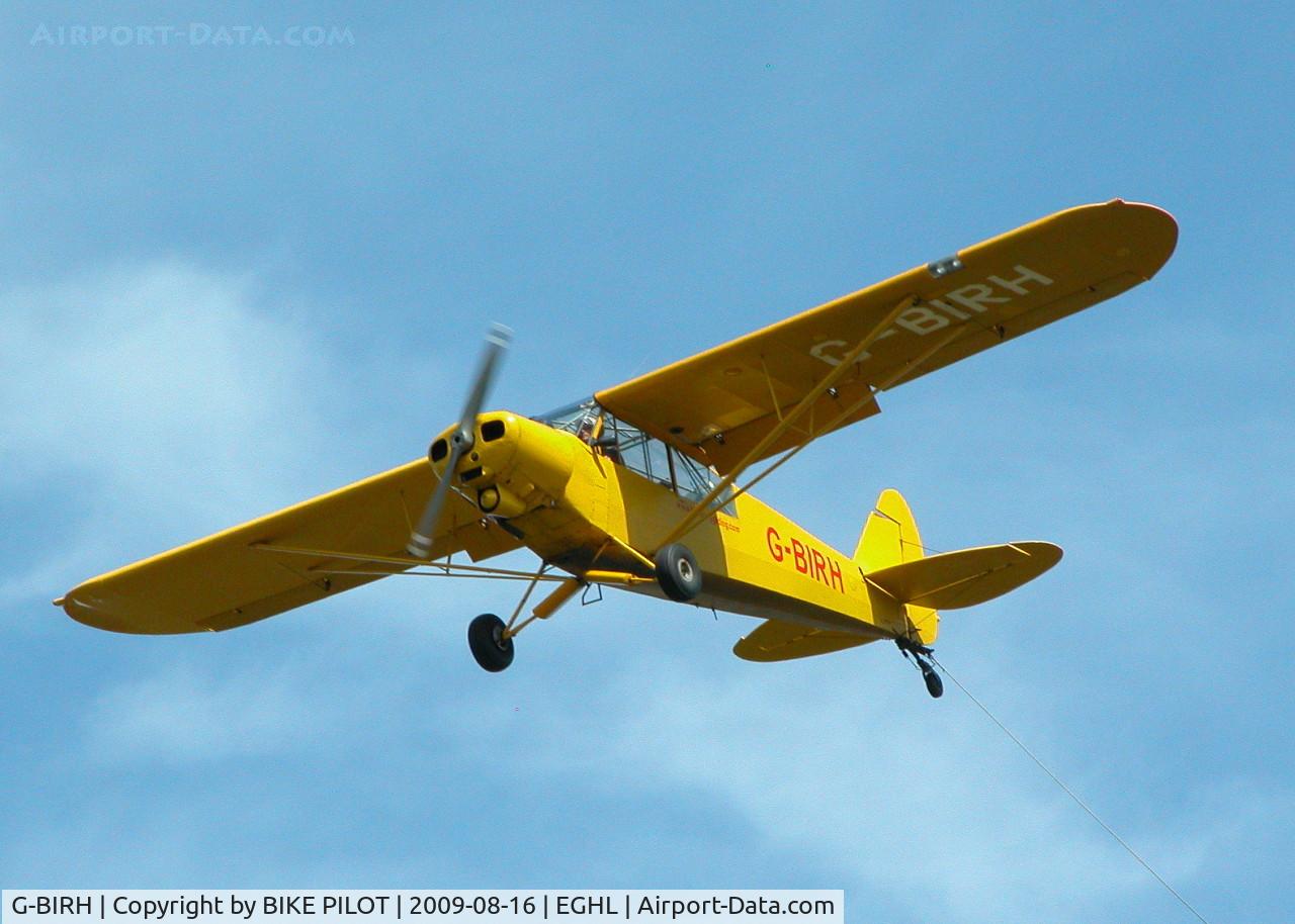 G-BIRH, 1955 Piper L-21B Super Cub (PA-18-135) C/N 18-3853, GLIDER TUG RETURNING FOR ANOTHER PICK UP DURING COMPETITIONS AT LASHAM