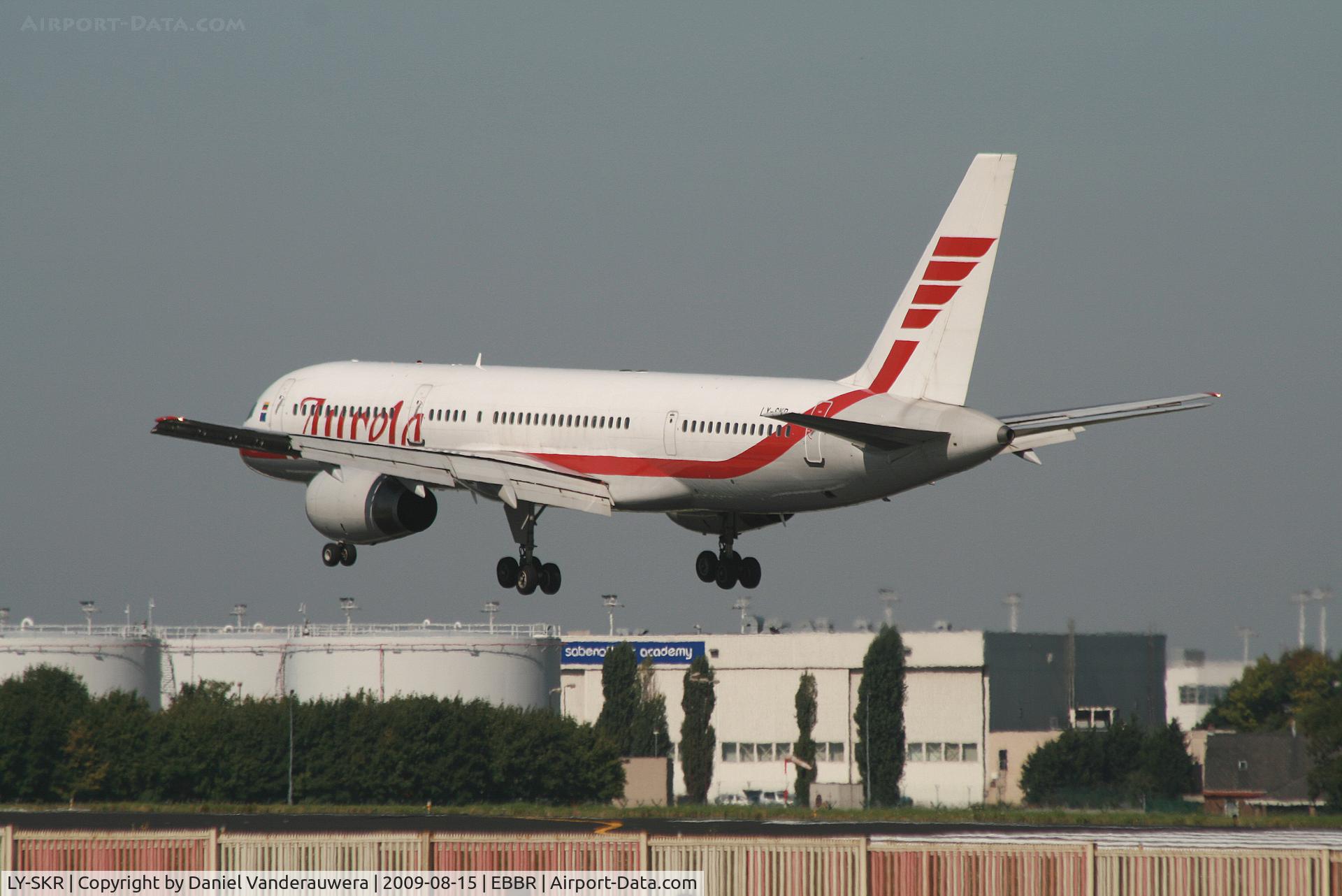 LY-SKR, 1999 Boeing 757-23N C/N 30233, several seconds before landing on rwy 25L