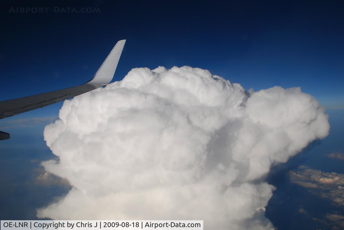 OE-LNR, 2005 Boeing 737-8Z9 C/N 33833, Huge cloud at FL380 somewhere over serbia
