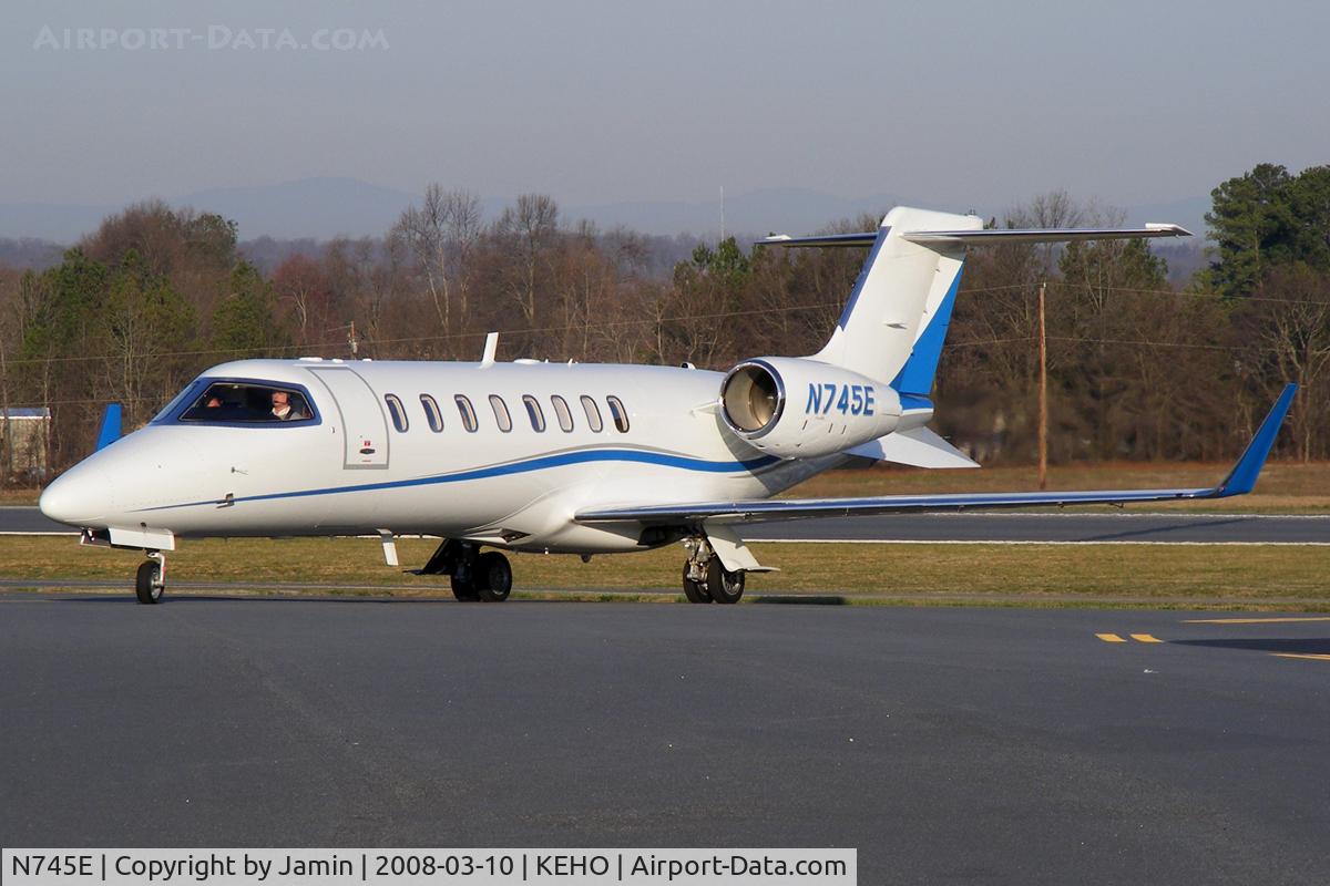 N745E, 2007 Learjet Inc 45 C/N 348, Taxiing up the ramp after an early morning arrival.