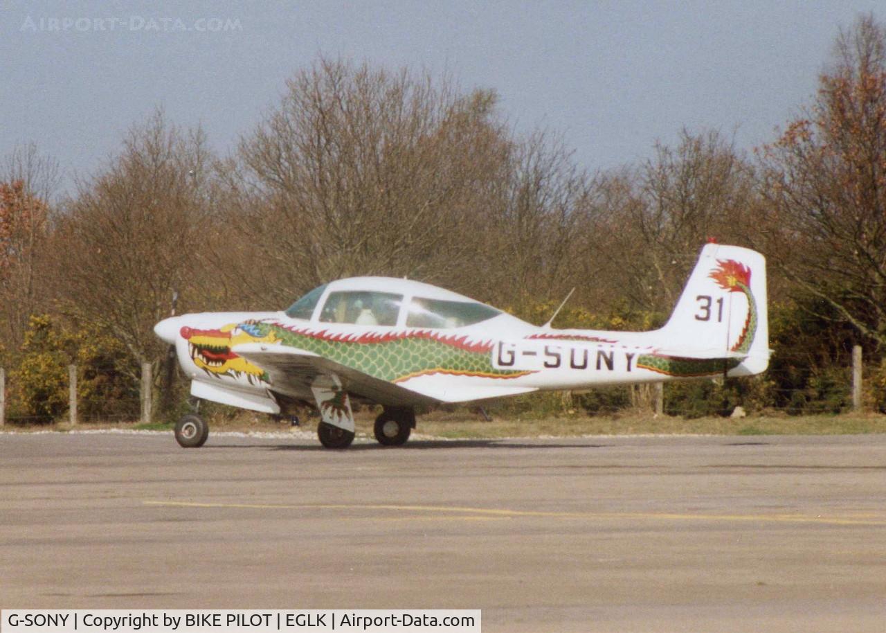 G-SONY, 1967 Aero Commander 200D C/N 358, AERO COMMANDER 200D HEADING TOWARDS RWY 25, ONE OF ONLY 77 BUILT THIS A/C WAS WELL KNOWN ON THE AIR RACE CIRCUIT. THE DRAGON WAS DIFFERENT BOTH SIDES AND CHANGED DESIGN OVER THE YEARS A/C NOW DEREGISTERED. PHOTO 1991-03