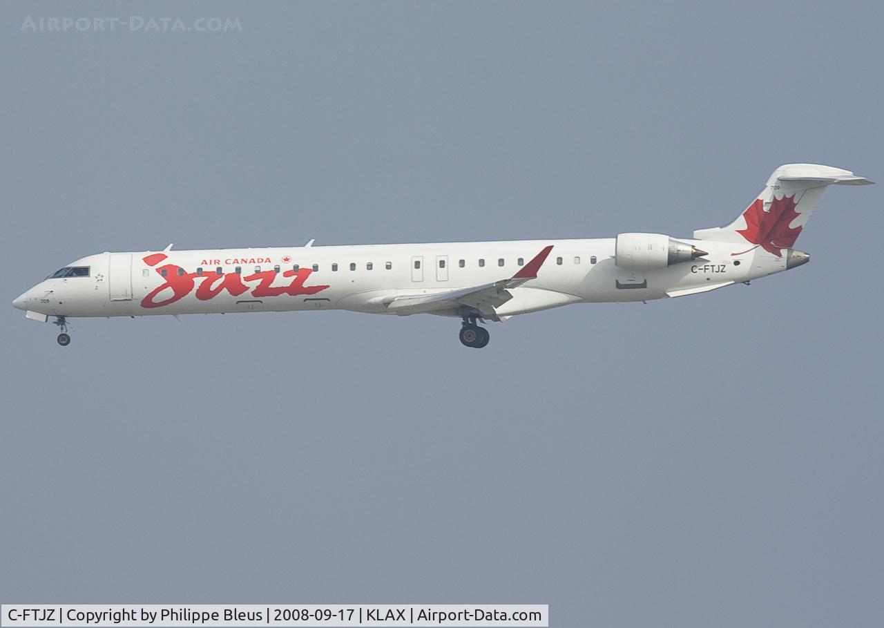 C-FTJZ, 2005 Canadair CRJ-705ER (CL-600-2D15) Regional Jet C/N 15047, Short final rwy 24R