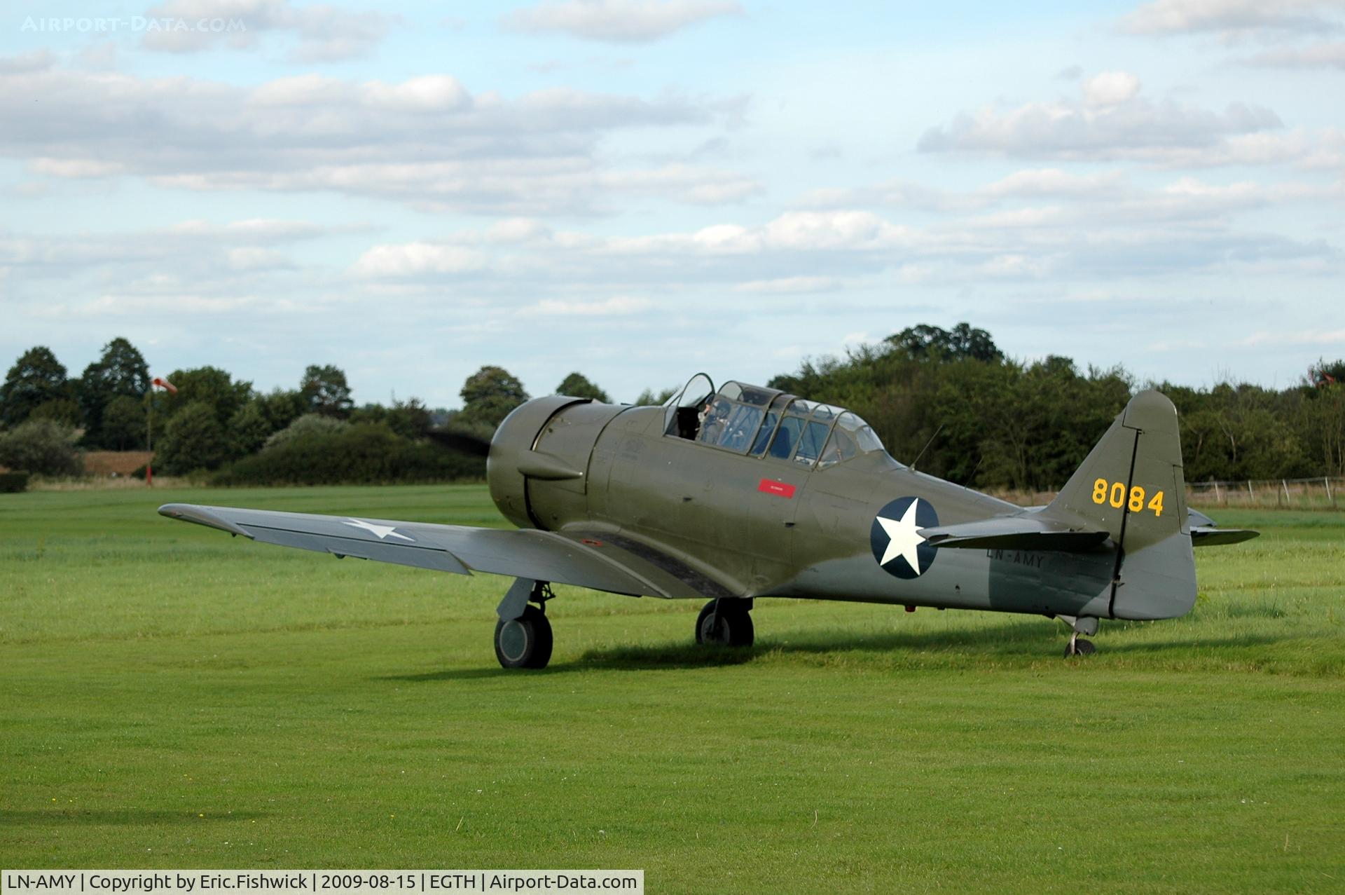 LN-AMY, North American AT-6D Harvard III C/N 88-16849 (42-85068), 1. 8084 T-6 Harvard departing the Shuttleworth Evening Air Display Aug 09