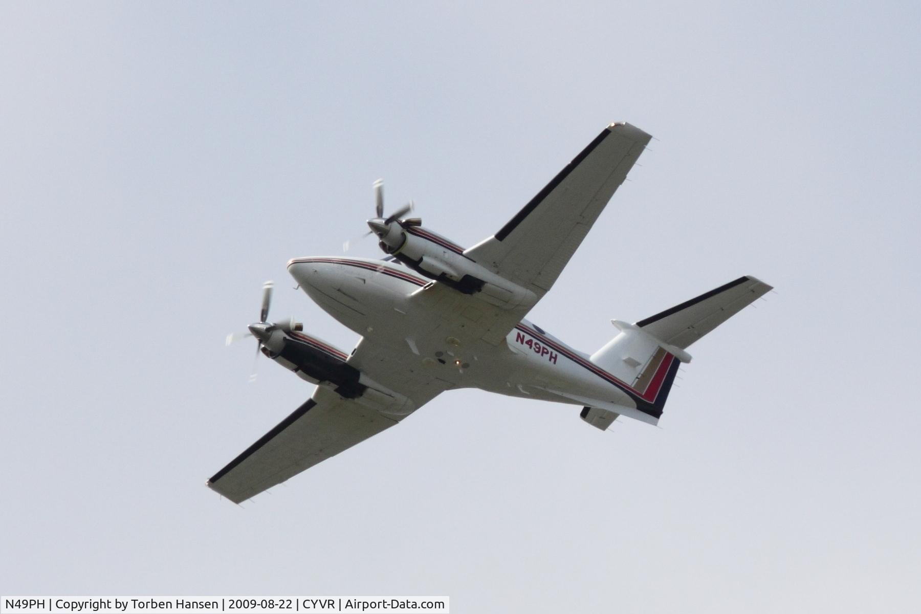 N49PH, 1980 Beech F90 King Air C/N LA-33, Beech F90 heading southeast, taken from south runway at CYVR.