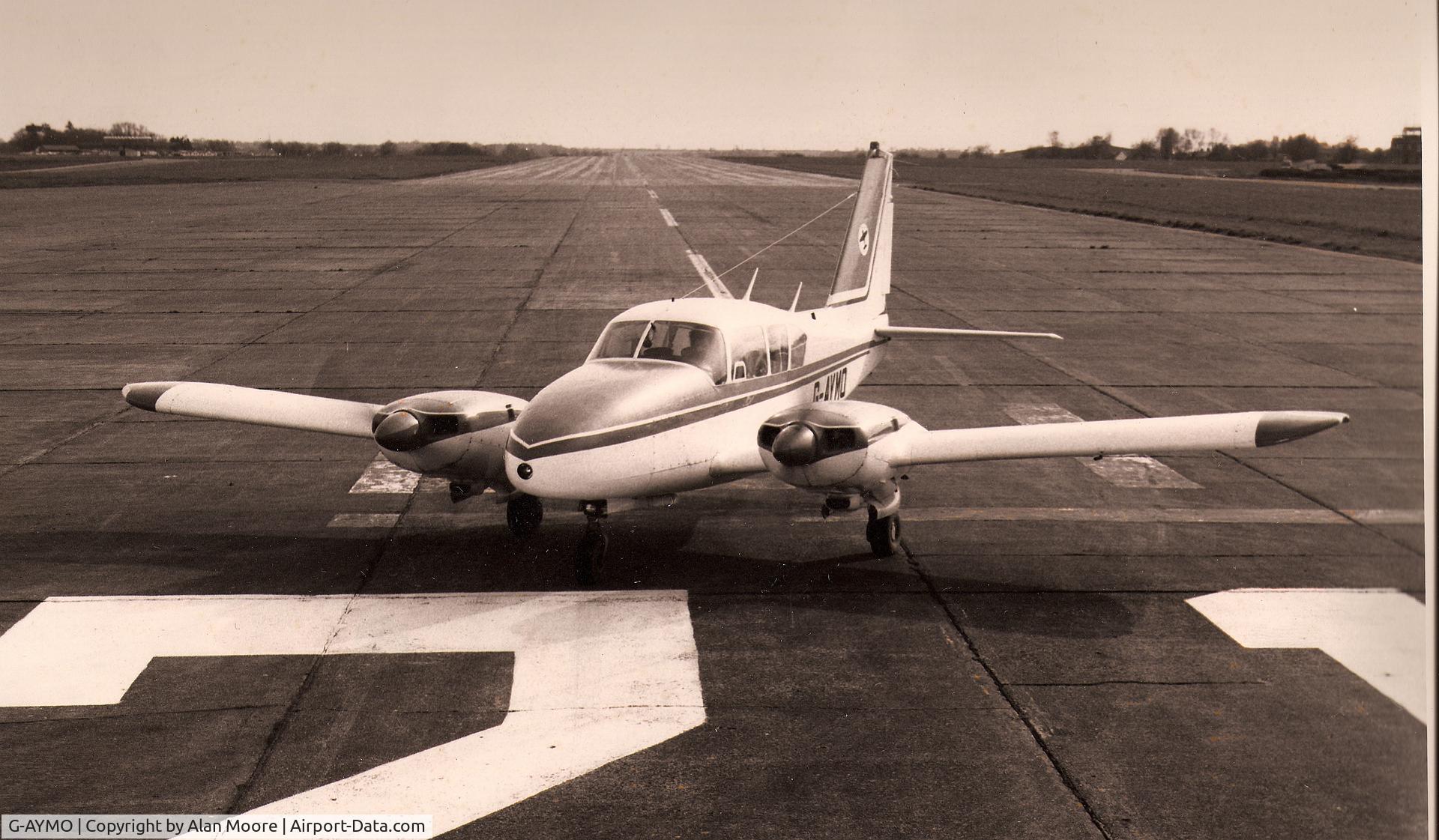 G-AYMO, 1965 Piper PA-23-250 Aztec C/N 27-2995, On Runway 21 at Biggin Hill in 1976