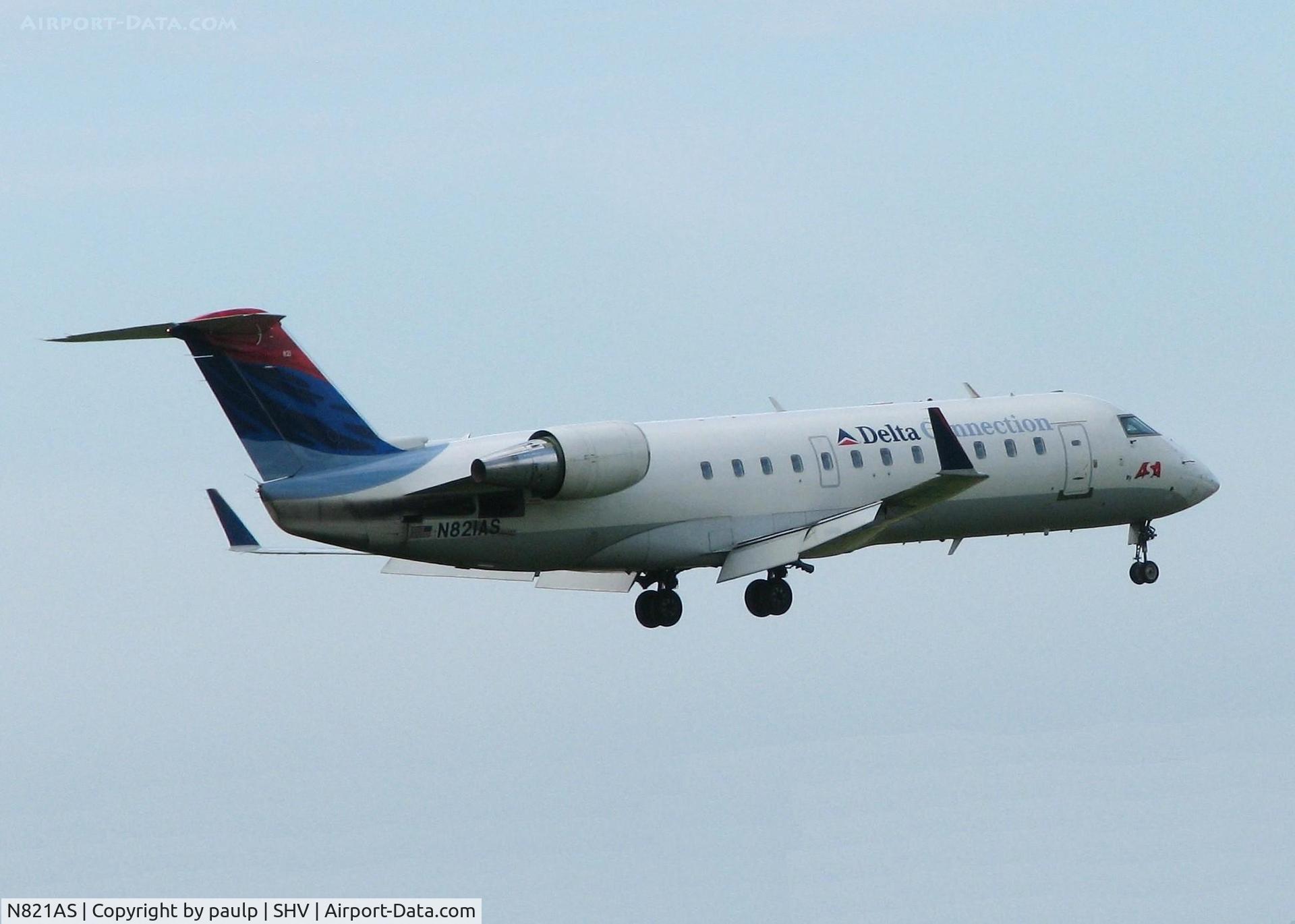 N821AS, 1997 Canadair CRJ-200LR (CL-600-2B19) C/N 7194, Landing at Shreveport Regional.