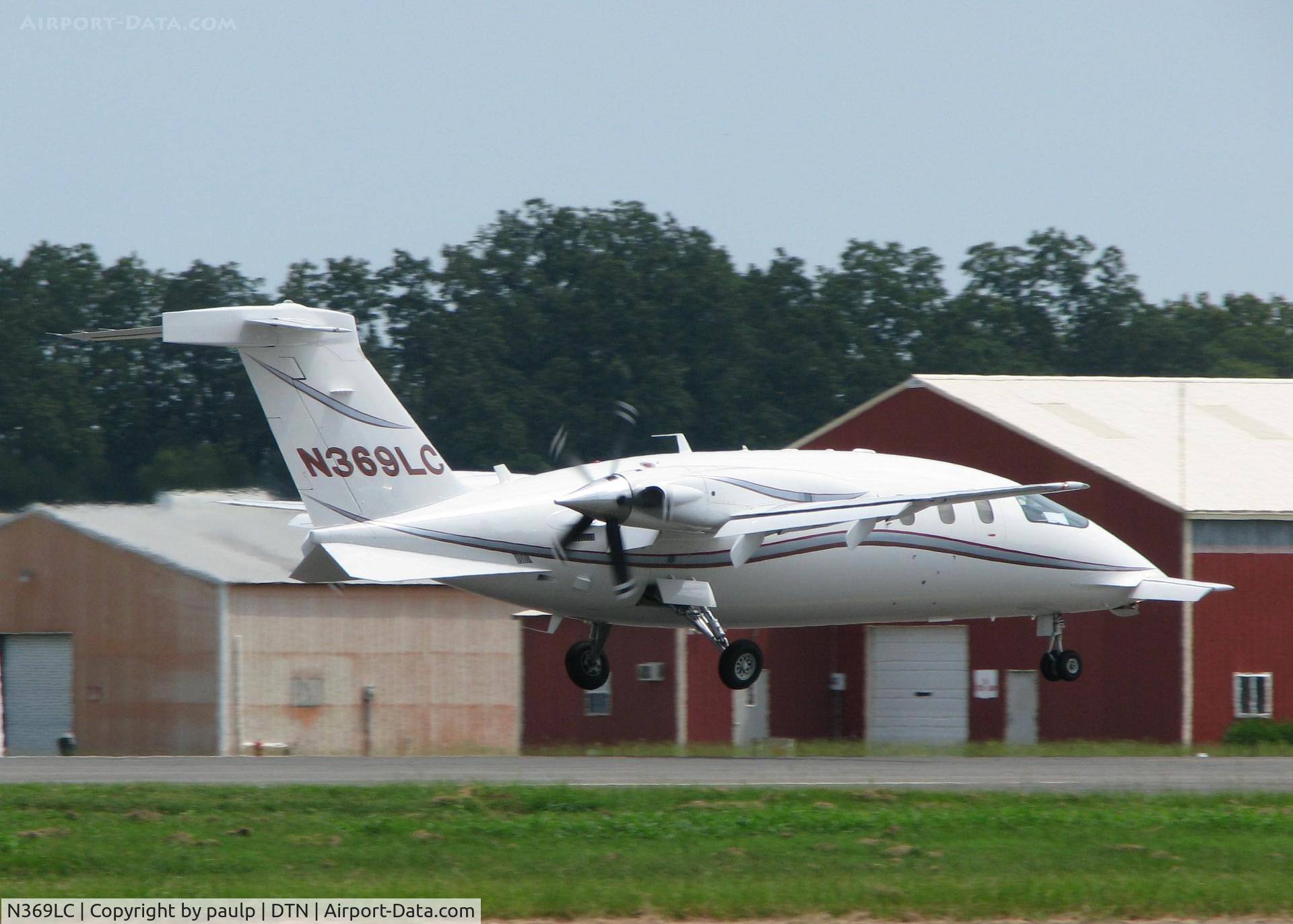 N369LC, 2008 Piaggio P-180 C/N 1154, About to touch down on runway 14.