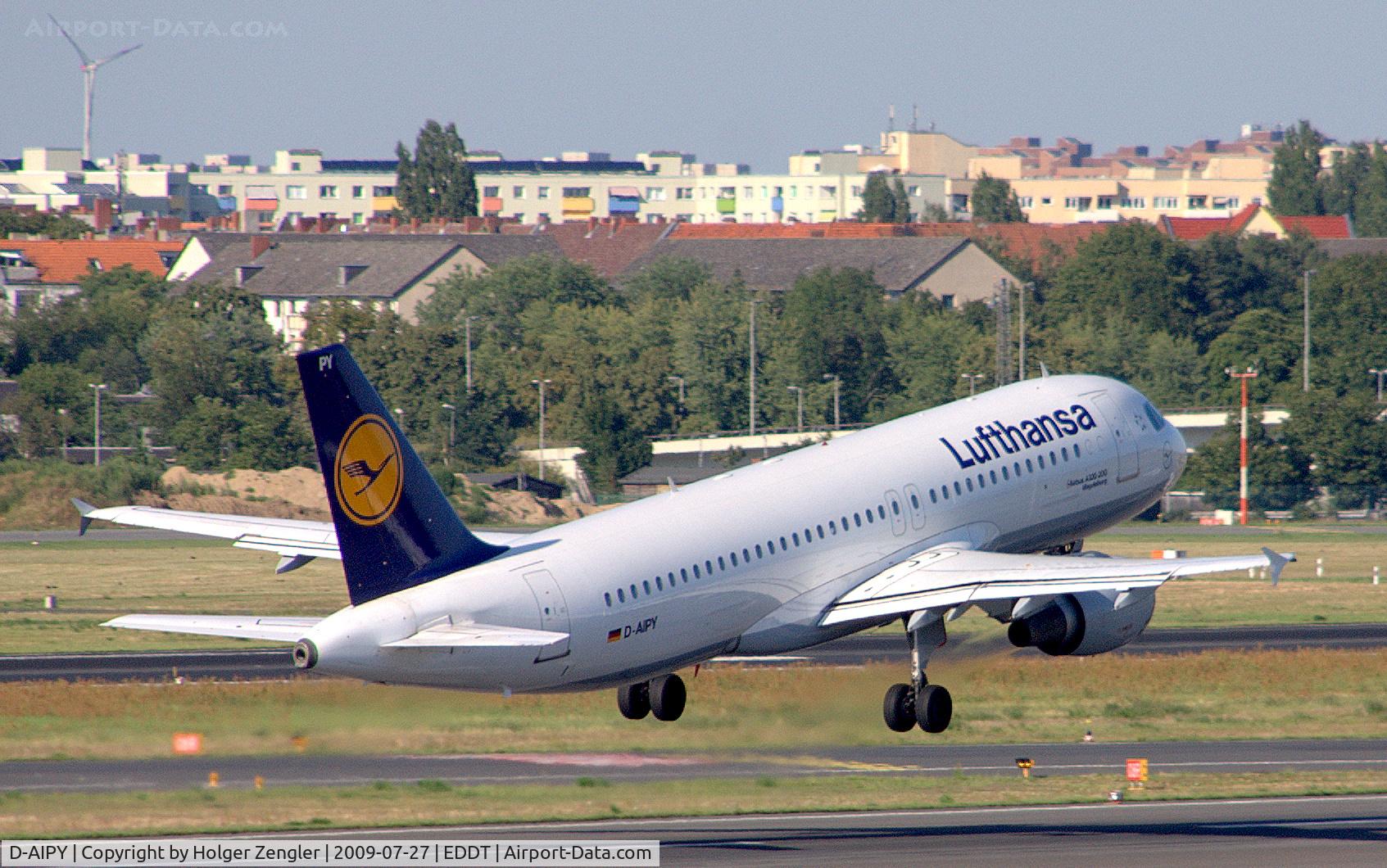 D-AIPY, 1991 Airbus A320-211 C/N 161, Leaving TXL on a carpet of hot air.