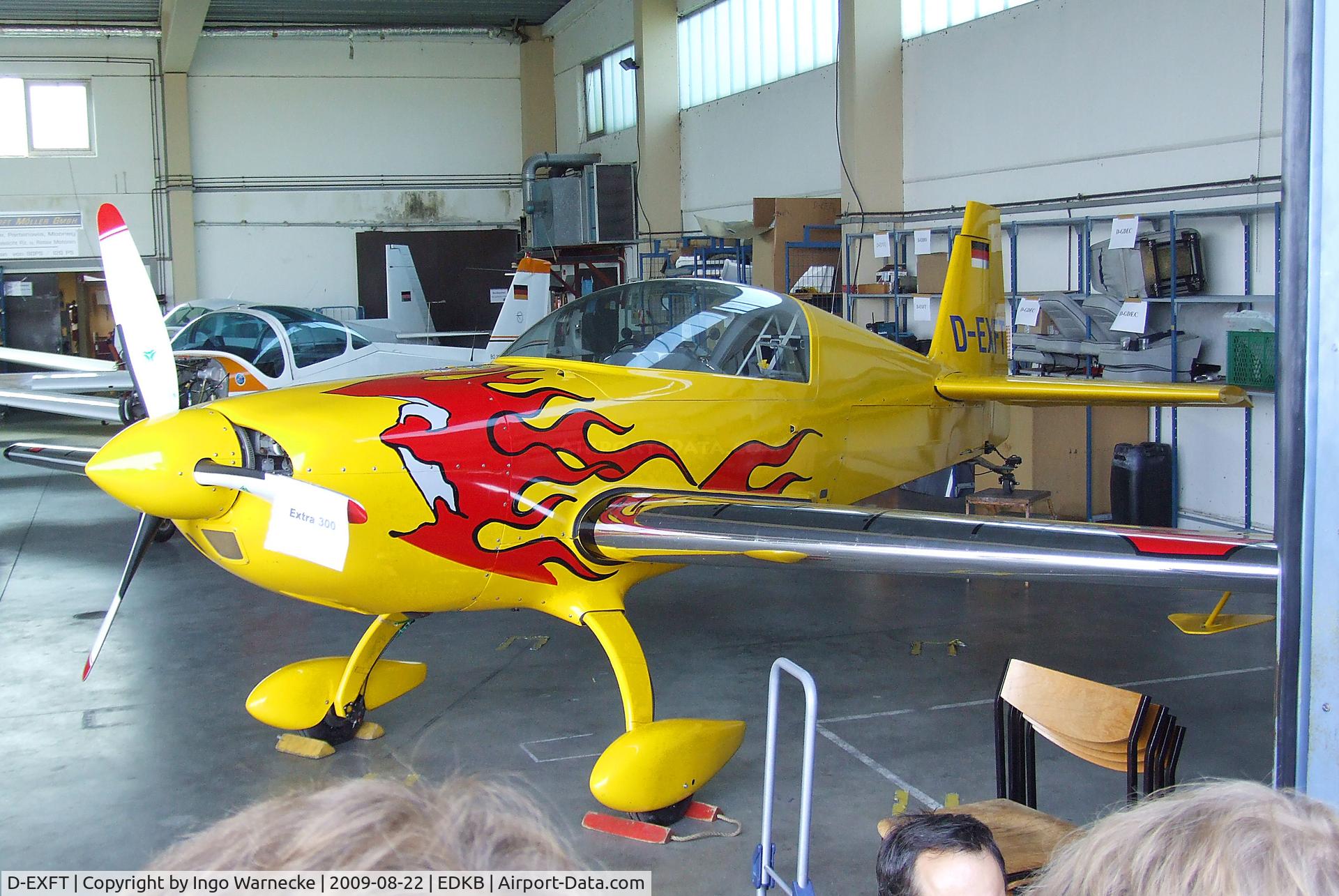 D-EXFT, Extra EA-200 C/N 025, Extra EA-200 in a maintenance hangar during the Bonn-Hangelar centennial jubilee airshow