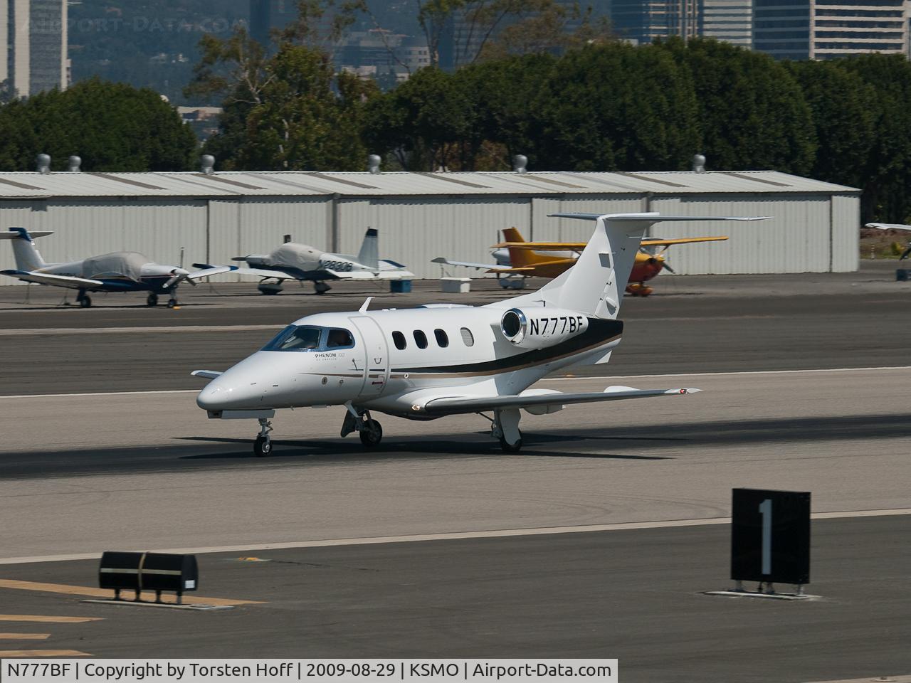 N777BF, 2009 Embraer EMB-500 Phenom 100 C/N 50000041, N777BF departing from RWY 21