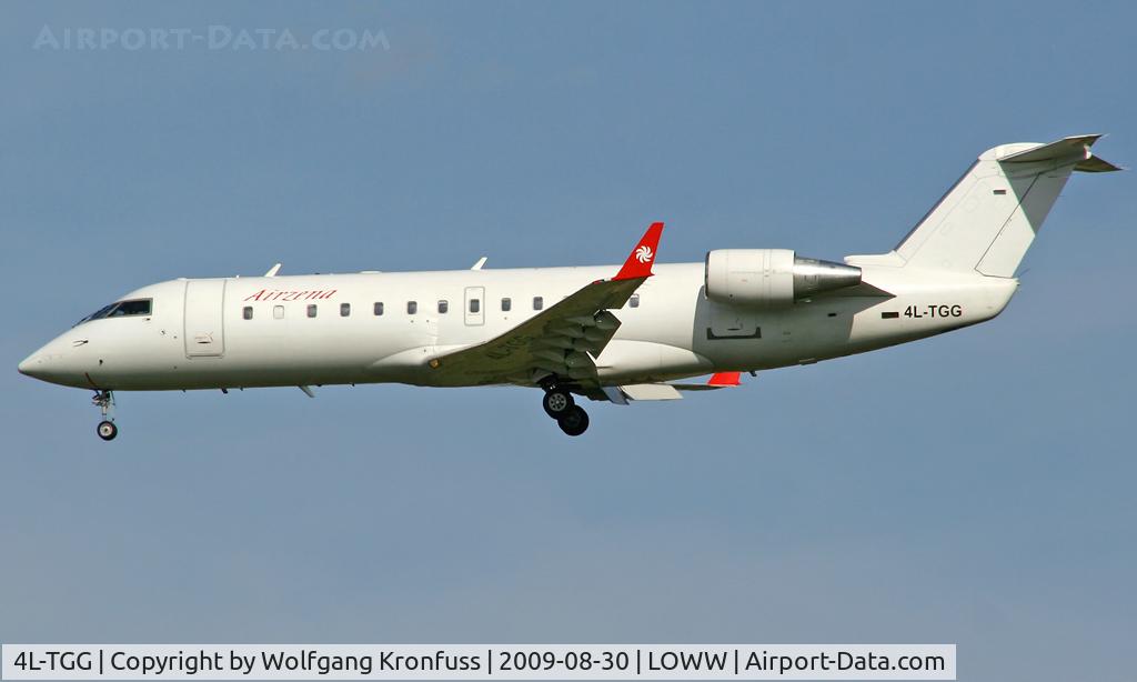 4L-TGG, 2000 Canadair CRJ-200LR (CL-600-2B19) C/N 7386, short finals RWY34