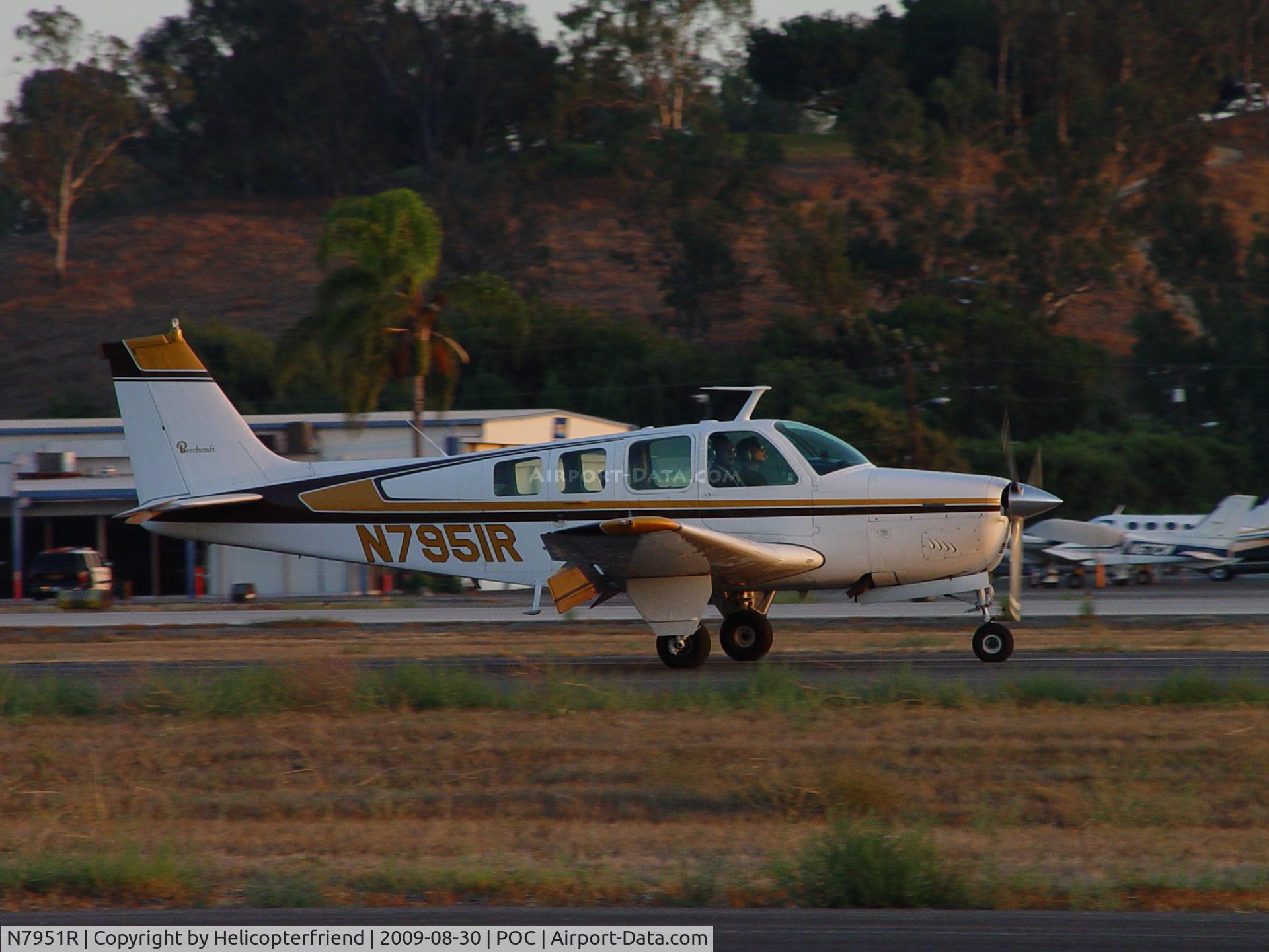 N7951R, 1969 Beech 36 Bonanza C/N E-145, Rolling out from landing on 8R at Brackett