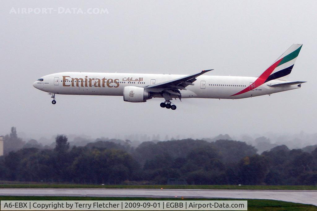 A6-EBX, 2007 Boeing 777-31H/ER C/N 32729, Emirates B777 landing at Birmingham UK in torrential rain