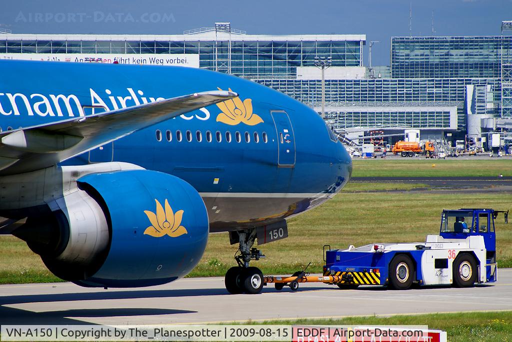 VN-A150, 2005 Boeing 777-2Q8/ER C/N 32717, Beeing towed to Terminal 2 for Pre Flight Preparation back Home to Hanoi.