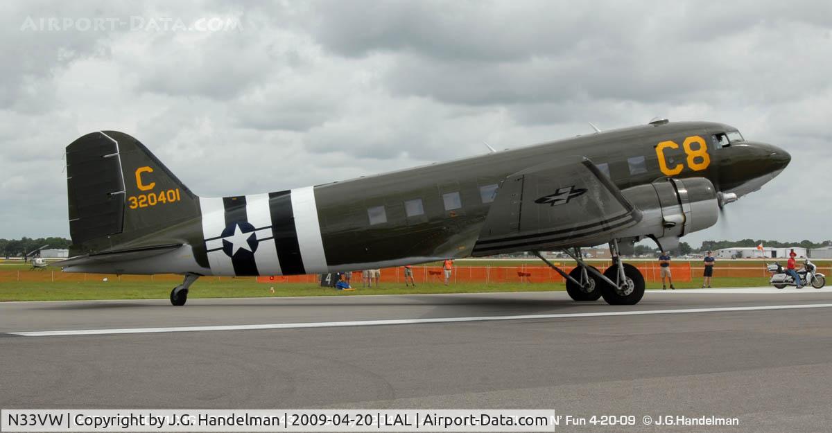 N33VW, 1943 Douglas DC3C-S1C3G (C-47A) C/N 20401, cloudy day, note large windows