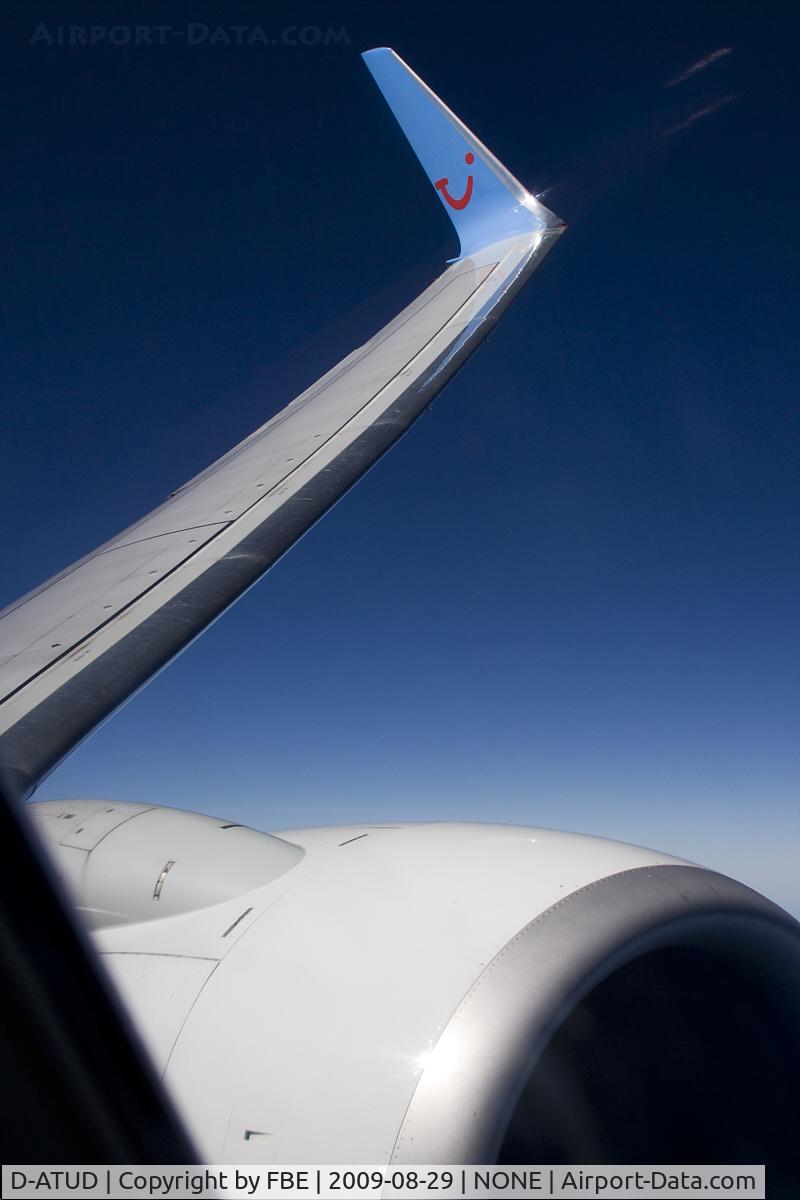 D-ATUD, 2006 Boeing 737-8K5 C/N 34685, right turn cruising at 33000 ft.