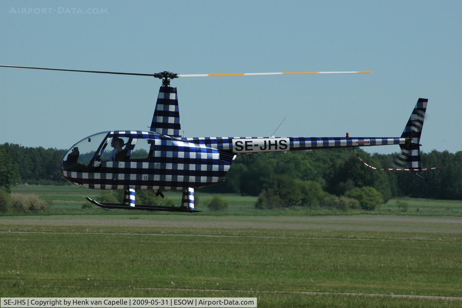 SE-JHS, 2000 Robinson R44 C/N 0792, R44 flying at Västerås Hässlö airport, Sweden.