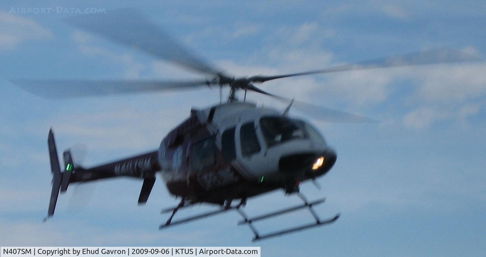 N407SM, 1998 Bell 407 C/N 53289, N407SM lifting off from MedTrans