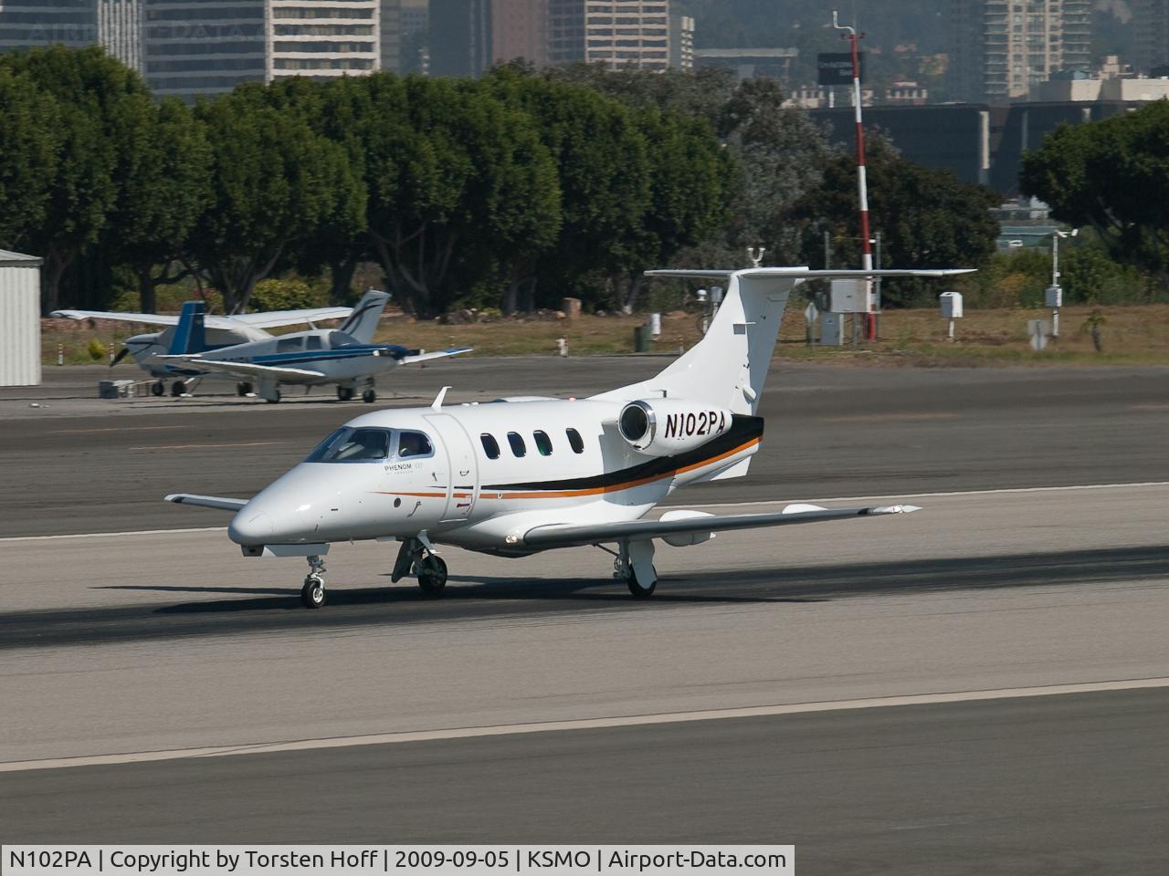 N102PA, 2009 Embraer EMB-500 Phenom 100 C/N 50000030, N102PA departing from RWY 21