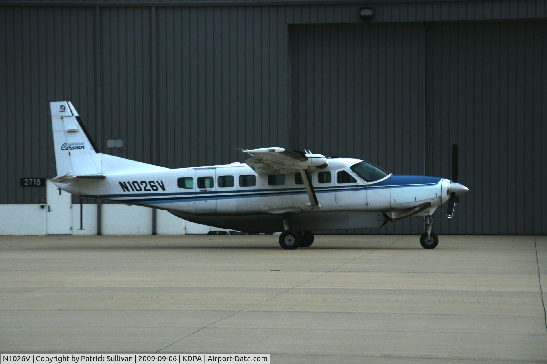 N1026V, 1992 Cessna 208B Grand Caravan C/N 208B0319, Parked outside a hangar