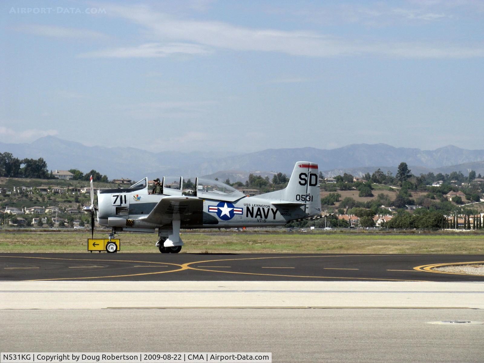 N531KG, 1954 North American T-28C Trojan Trojan C/N 226-108, 1954 North American T-28C TROJAN 'Tough Old Bird', Wright R-1820-86  Cyclone 1,425 Hp, taxi that way