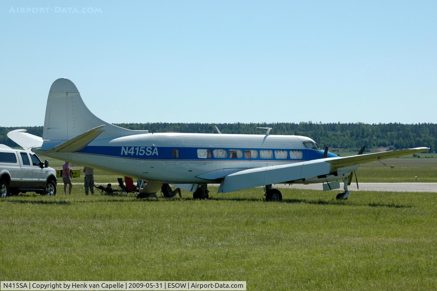 N415SA, 1954 De Havilland DH-114 Heron 2X C/N 14064, Enjoying the sun and air show at Västerås Hässlö airport, Sweden. This aircraft is actually converted into a Riley Turbo Skyliner.