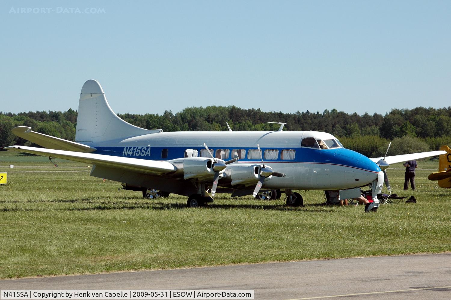 N415SA, 1954 De Havilland DH-114 Heron 2X C/N 14064, Enjoying the sun and air show at Västerås Hässlö airport, Sweden. This aircraft is actually converted into a Riley Turbo Skyliner.