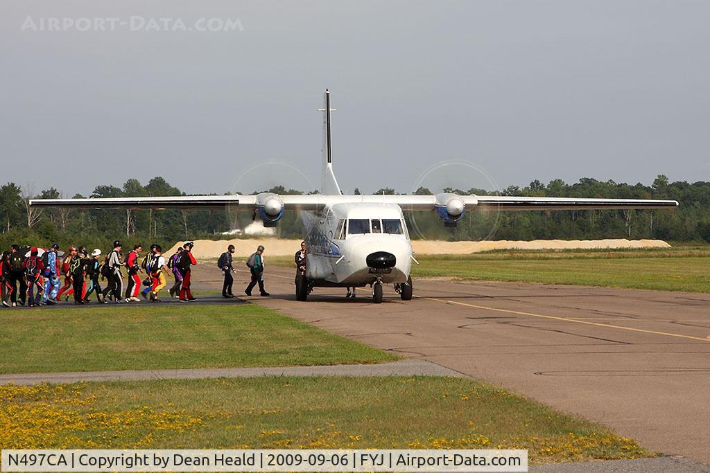 N497CA, 1983 CASA C-212-200 Aviocar C/N 291, Faynard Enterprises LLC 1983 CASA C-212-200 N497CA loading up a group of skydivers for the West Point Skydiving Adventures operation.