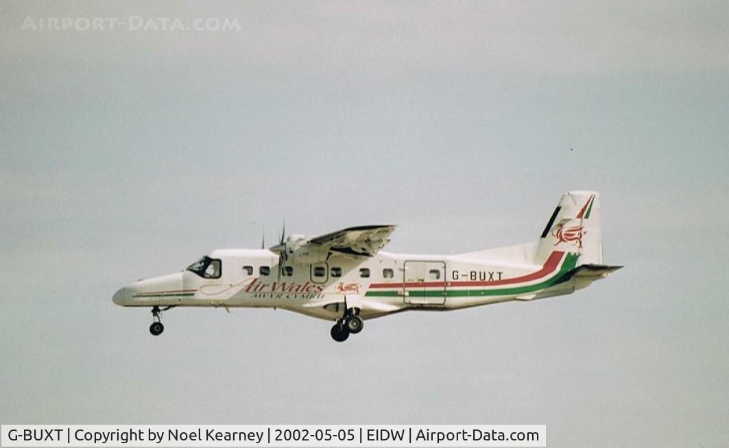 G-BUXT, 1986 Dornier 228-202K C/N 8065, Landing Rwy 28 (Scanned image)