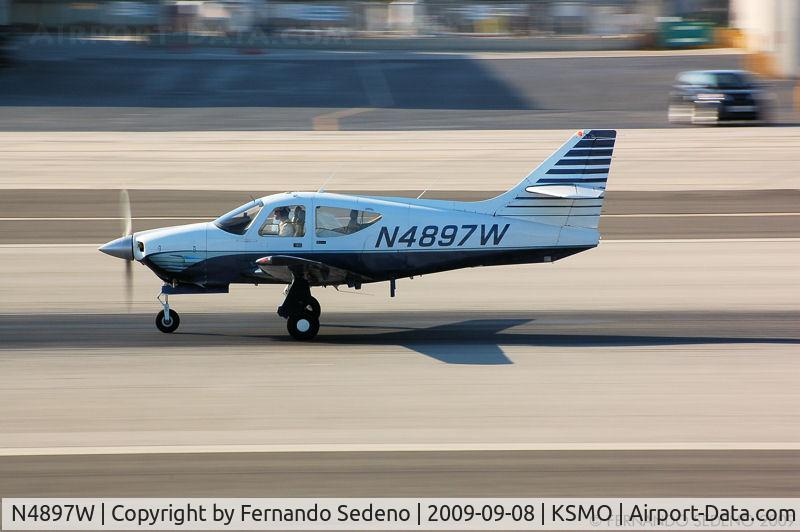 N4897W, 1977 Rockwell International 114 Commander C/N 14227, Departing SMO.