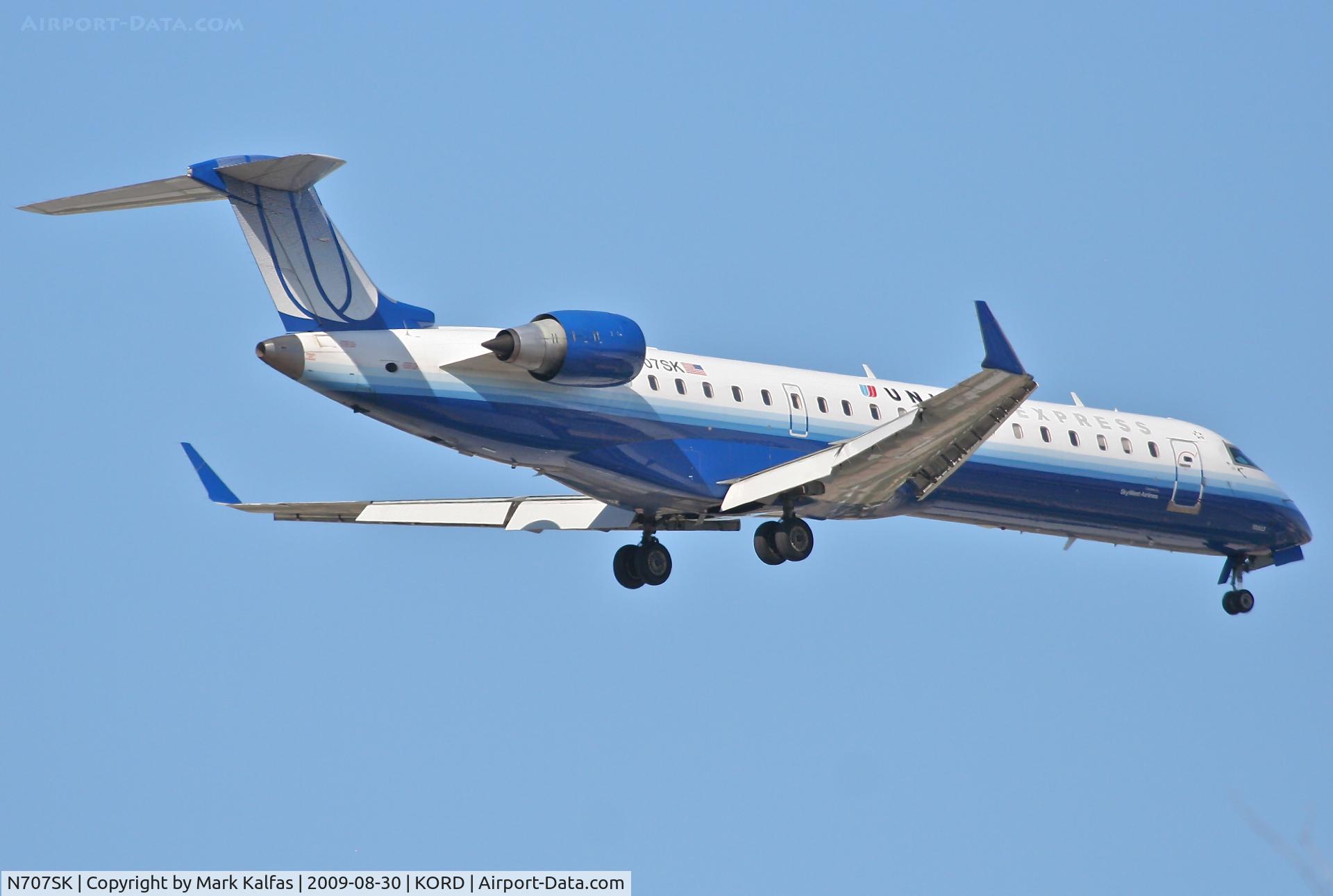 N707SK, 1999 Bombardier CRJ-701ER (CL-600-2C10) Regional Jet C/N 10003, Sky West/ United Express Bombardier CL-600-2C10, N707SK on final RWY 10 KORD