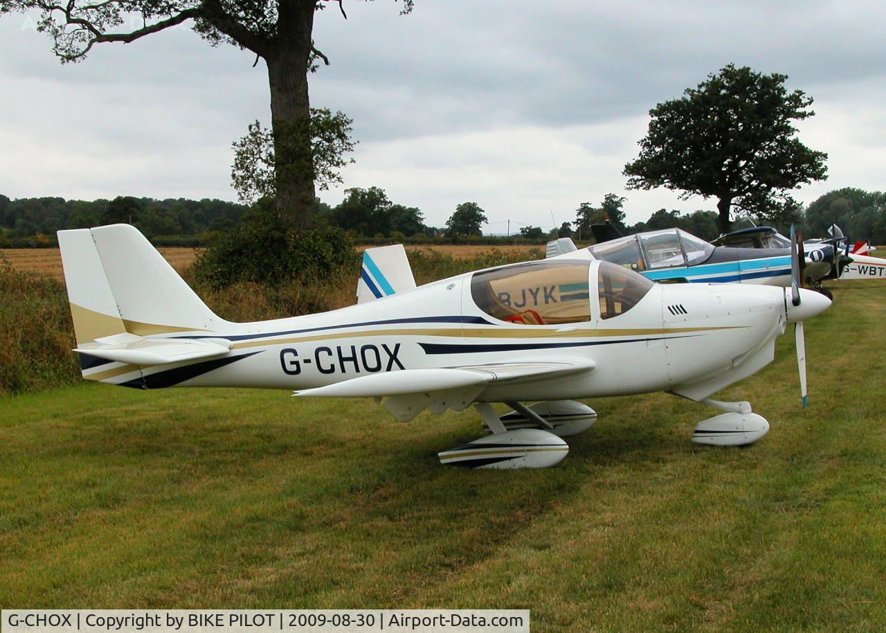G-CHOX, 2003 Europa XS Tri-Gear C/N PFA 247-13974, AS EUROPA'S GO THIS ONE'S QUITE COLORFUL. BRIMPTON FLY-IN