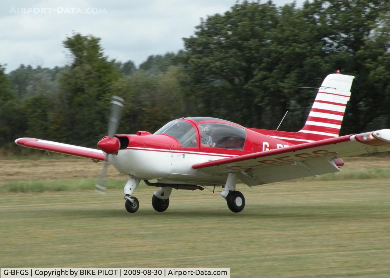 G-BFGS, 1975 Socata MS-893E Rallye 180GT Gaillard C/N 12571, JUST ABOUT TO TOUCH DOWN ON RWY 25. PREV. REG. F-BXYK. BRIMPTON FLY-IN