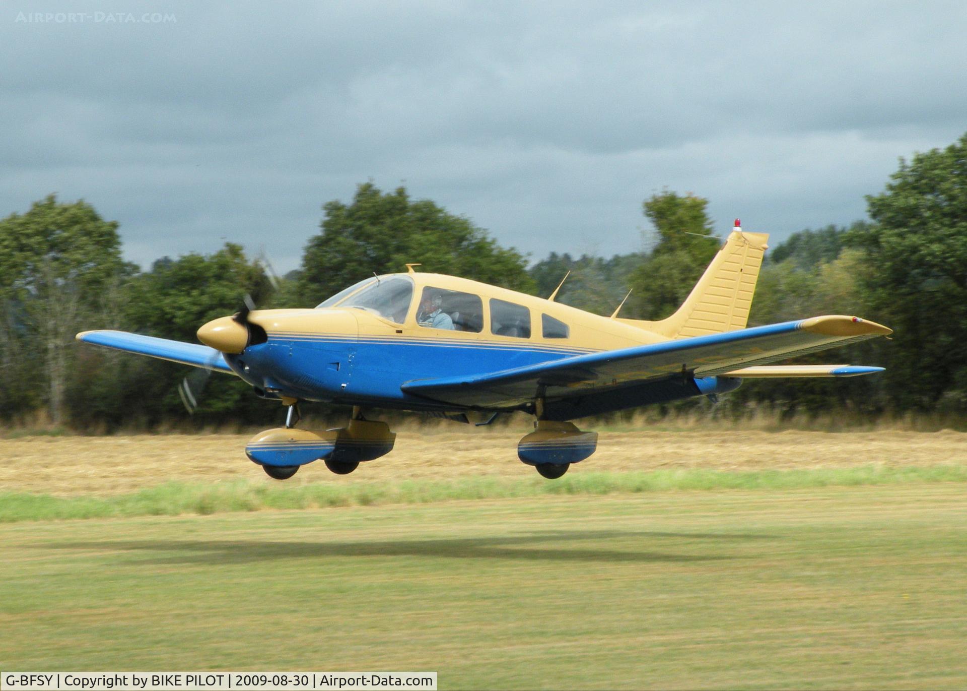 G-BFSY, 1977 Piper PA-28-181 Cherokee Archer II C/N 28-7890200, ABOUT TO ARRIVE ON RWY 25. BRIMPTON FLY-IN