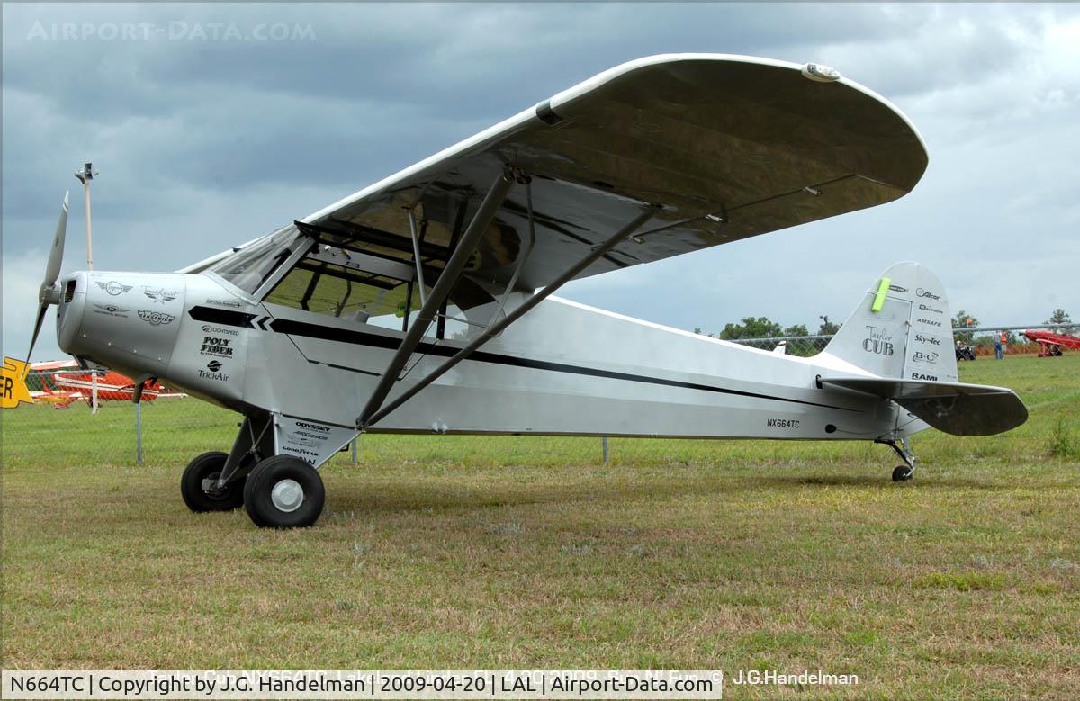 N664TC, Piper Cub Replica C/N TX-1020, storm couds over Taylor Cub